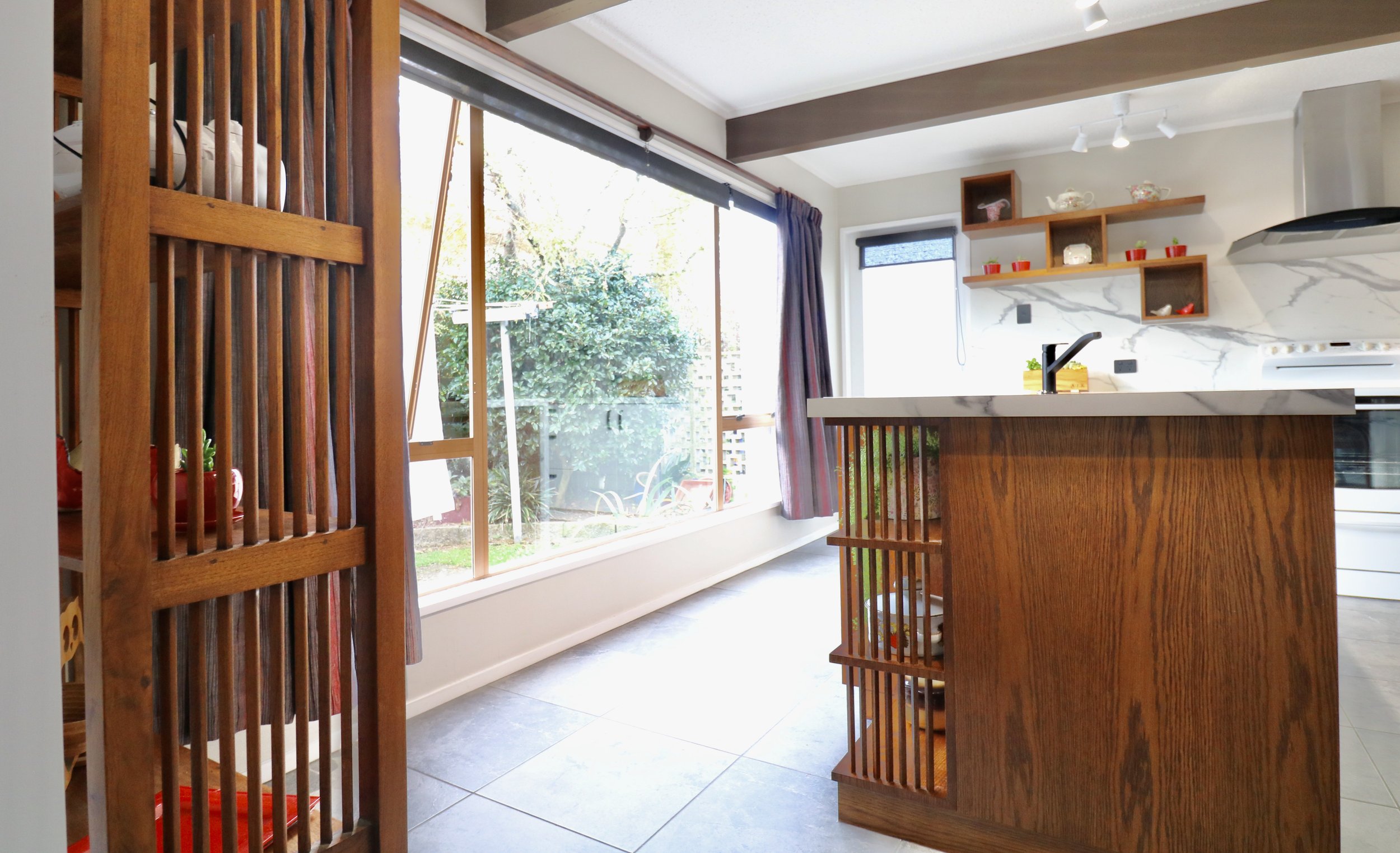 *Showing the Matching detail with the existing unit on the left and the new kitchen Island on the right made with American White oak Veneer crown cut stained to match the existing unit