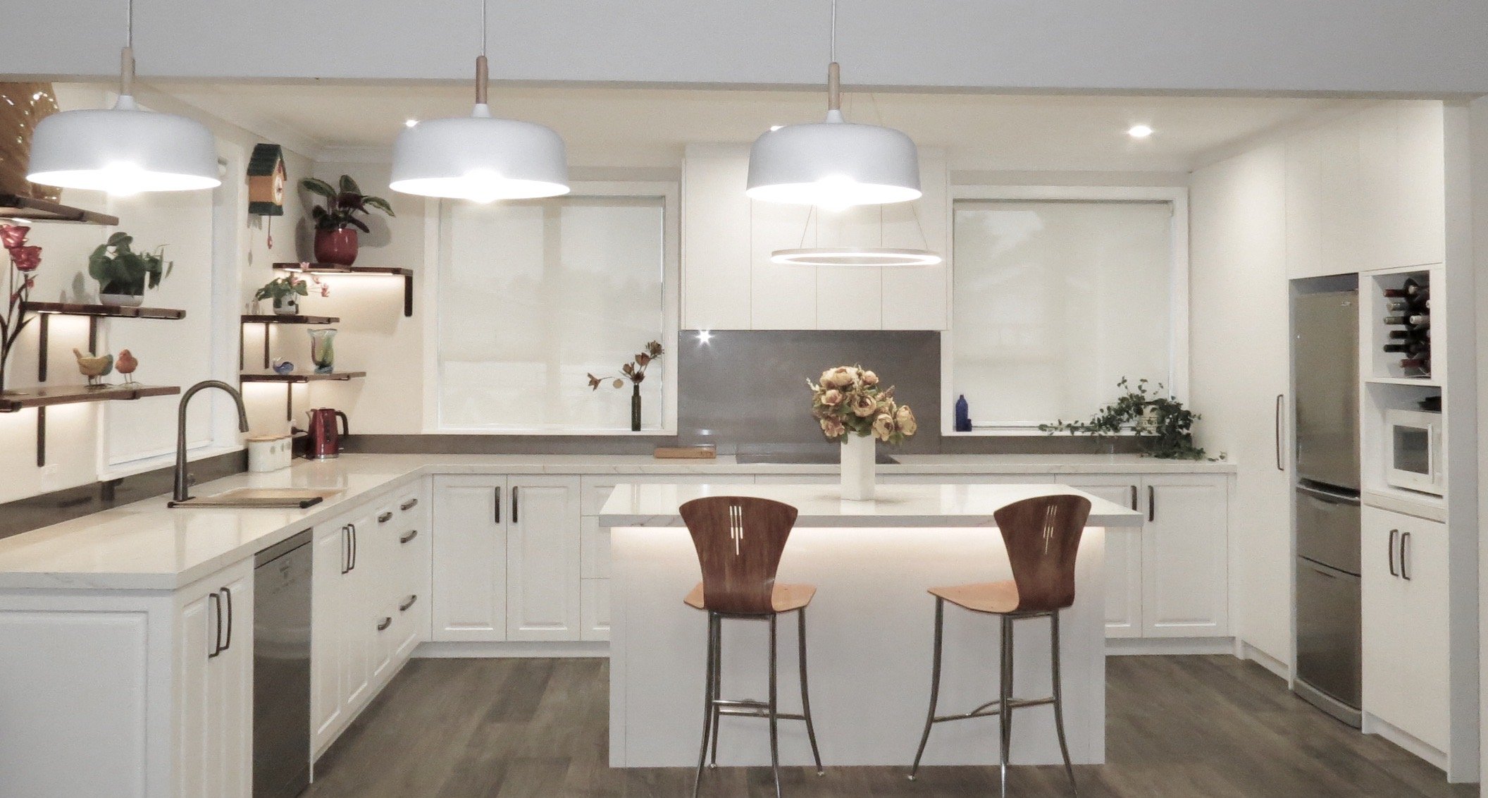*Bespoke shelves with recessed LED strip lighting
*Benchtop-Prime Stone Finelli Polished 40mm Thick with square edges
*Cabinet fronts-Dezignatek Thermoform Nelson Style in Designer white colour
*Island, rangehood and fridge wall panels and fronts Pri