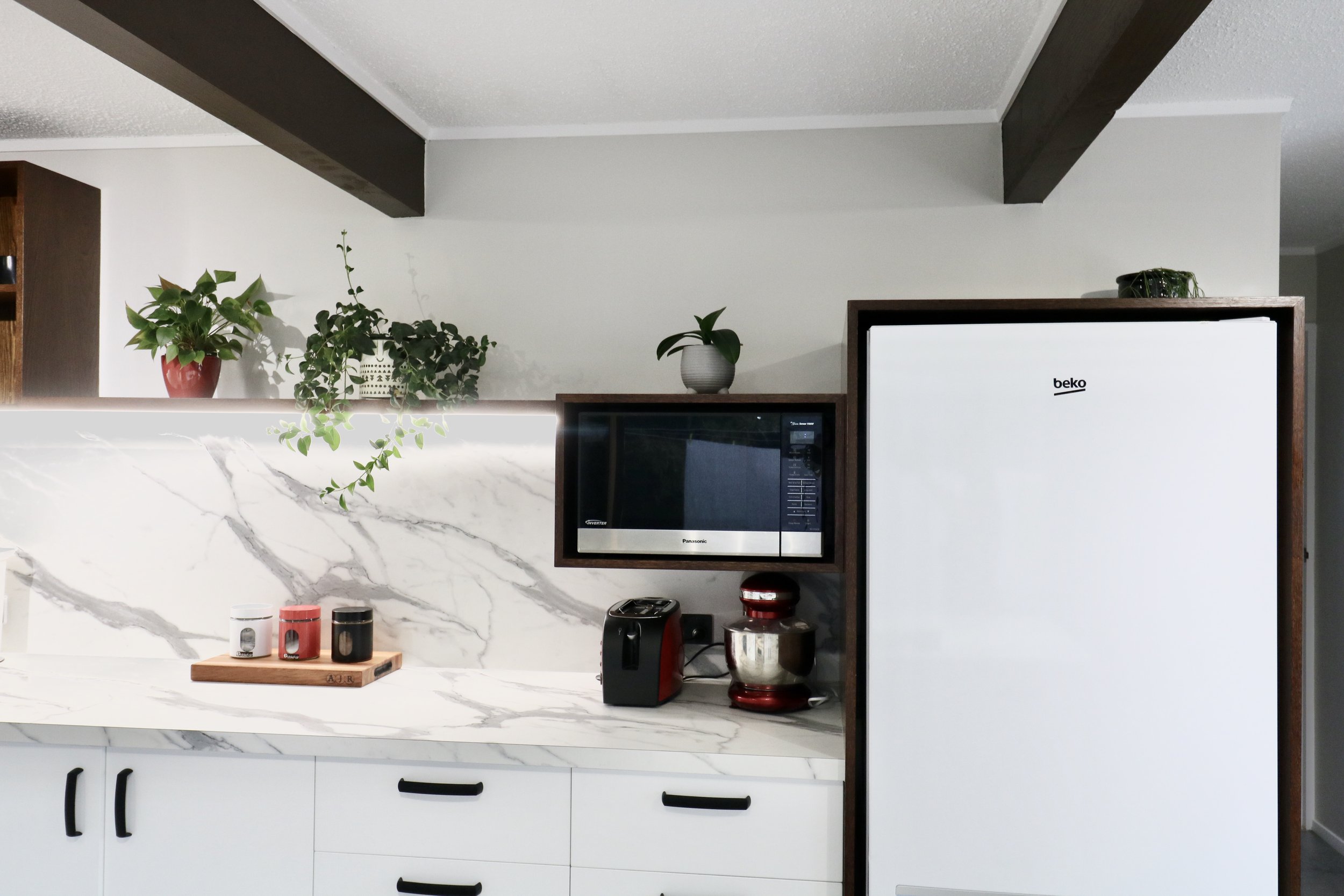 *Custom made Fridge and microwave unit with floating shelf all made from American White Oak Veneer Stained to match an existing unit