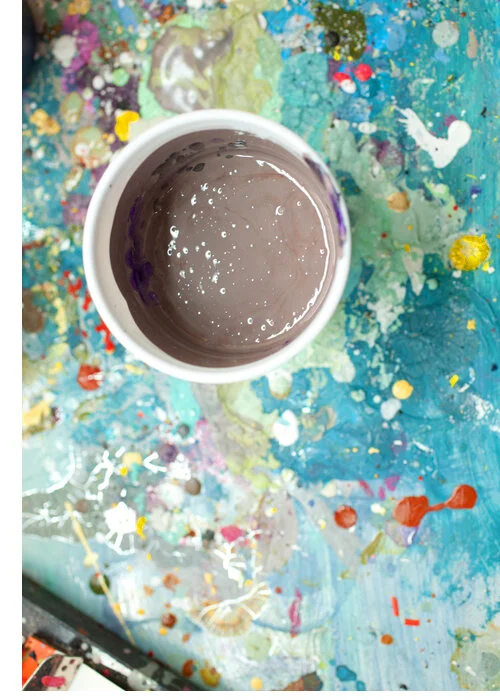 cup of paint in the print house