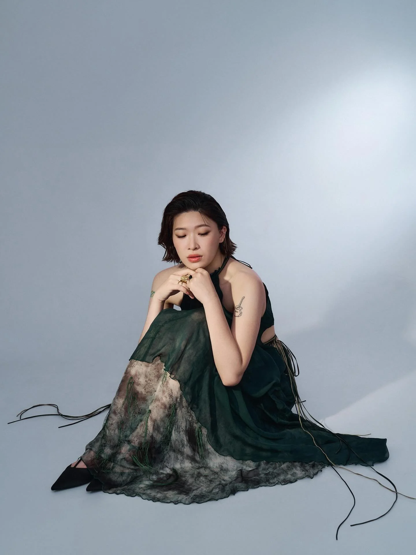 ShuChan Chiu wearing Mini C ear cuff with chain, Ribbon and Plate Rings