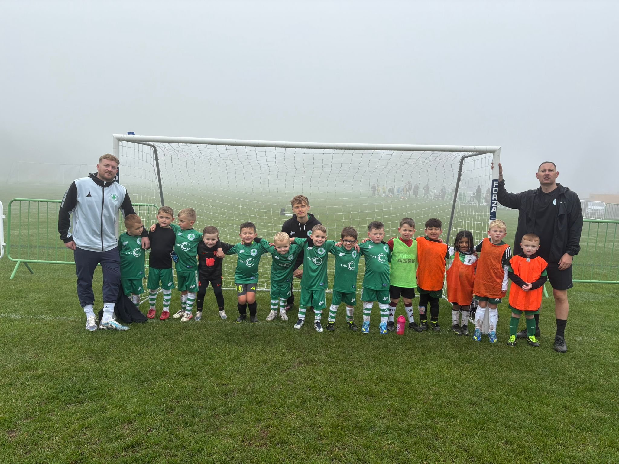 Young CCC boys team, coaches, football net