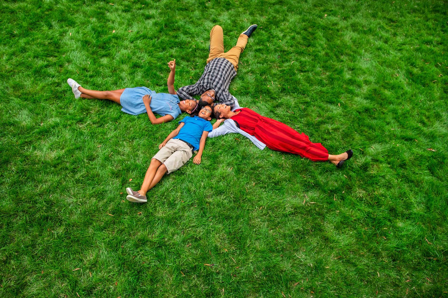 family-laying-on-grass_Robert_Holland.jpg