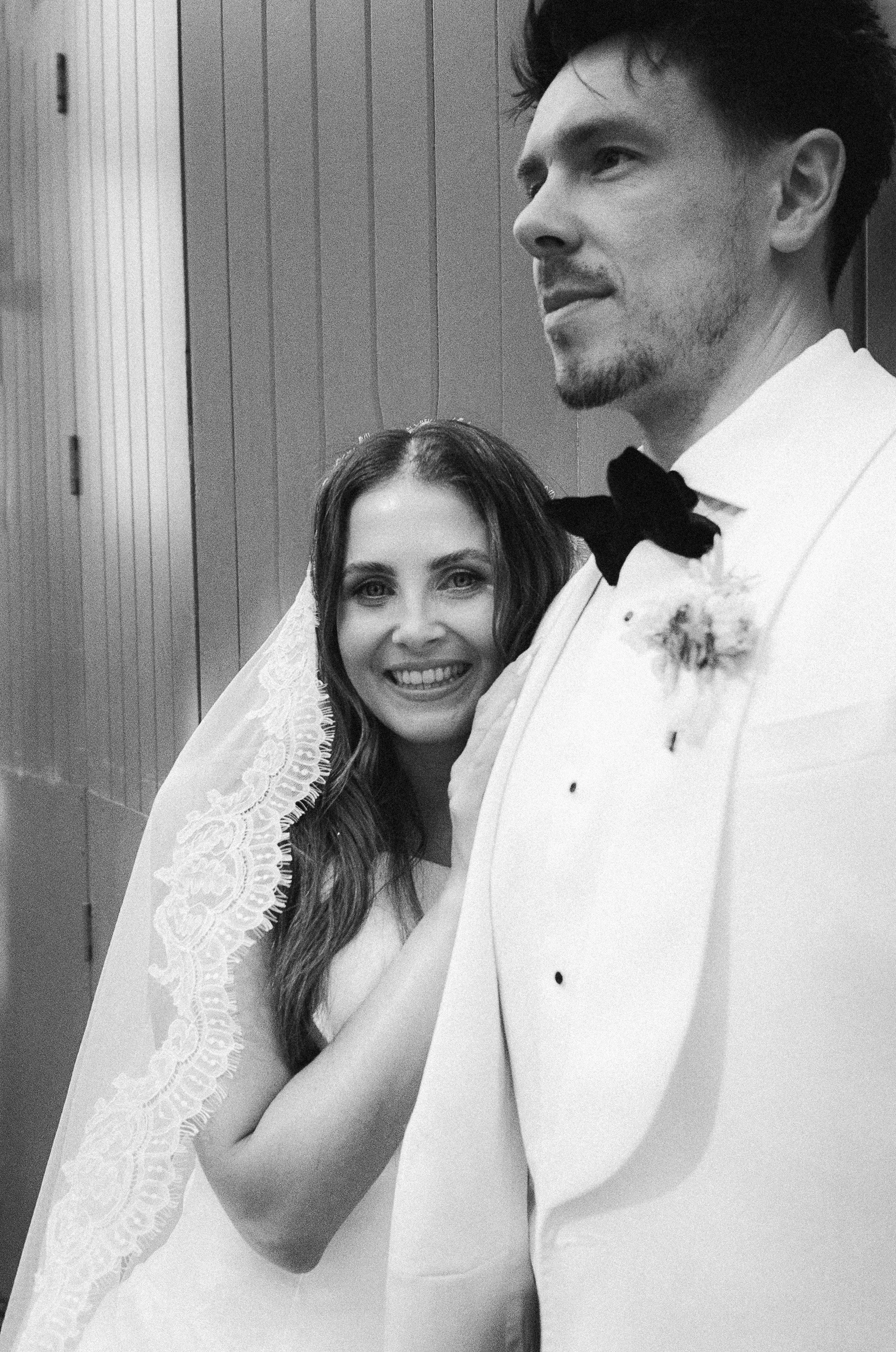 Couple portrait for Hannah & Jake's classic white wedding at Halle St Peter’s, Manchester