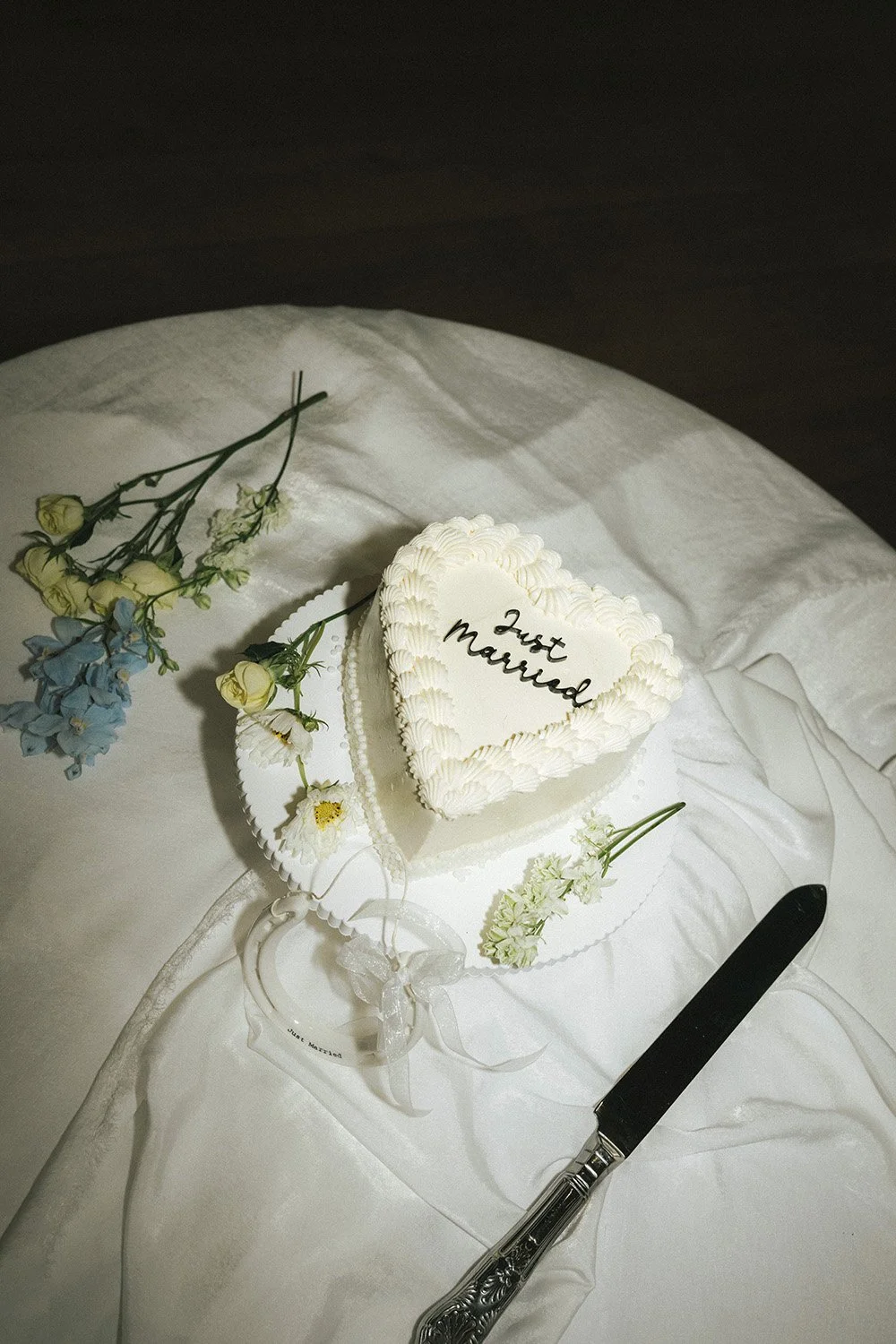 The Lana design Wedding cake for Hannah & Jake's classic white wedding at Halle St Peter’s, Manchester