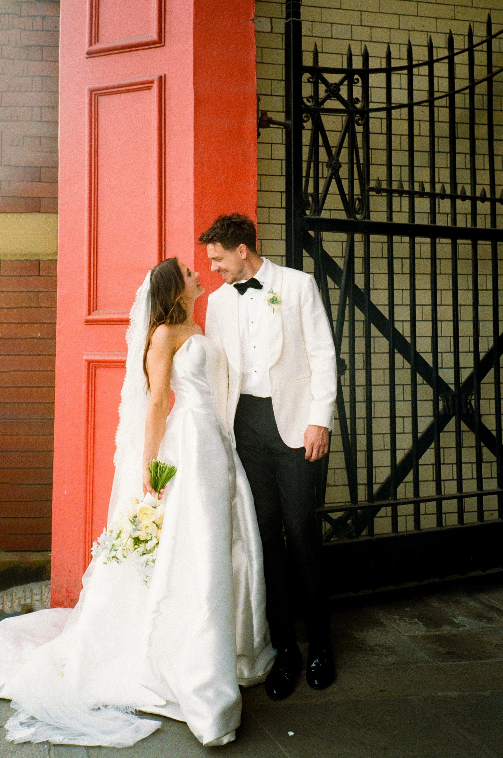 Couple portrait for Hannah & Jake's classic white wedding at Halle St Peter’s, Manchester