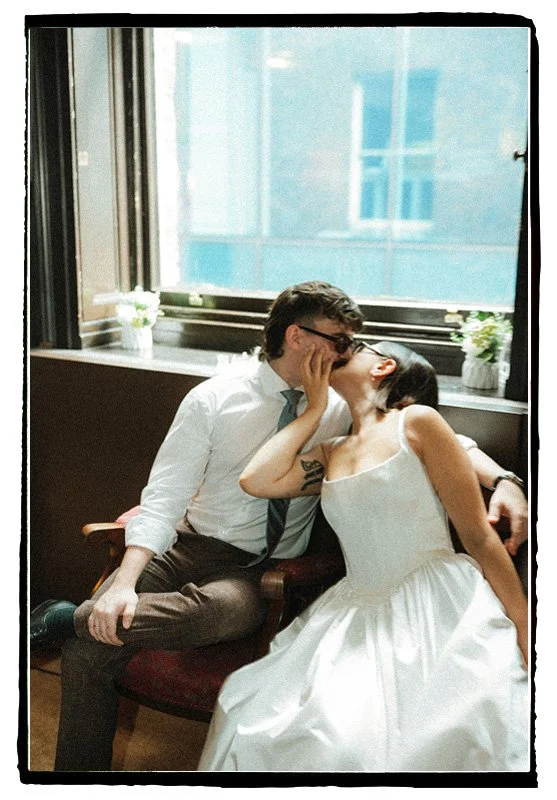 The first kiss for Emily & Mitchell's wedding at The portico Library Manchester