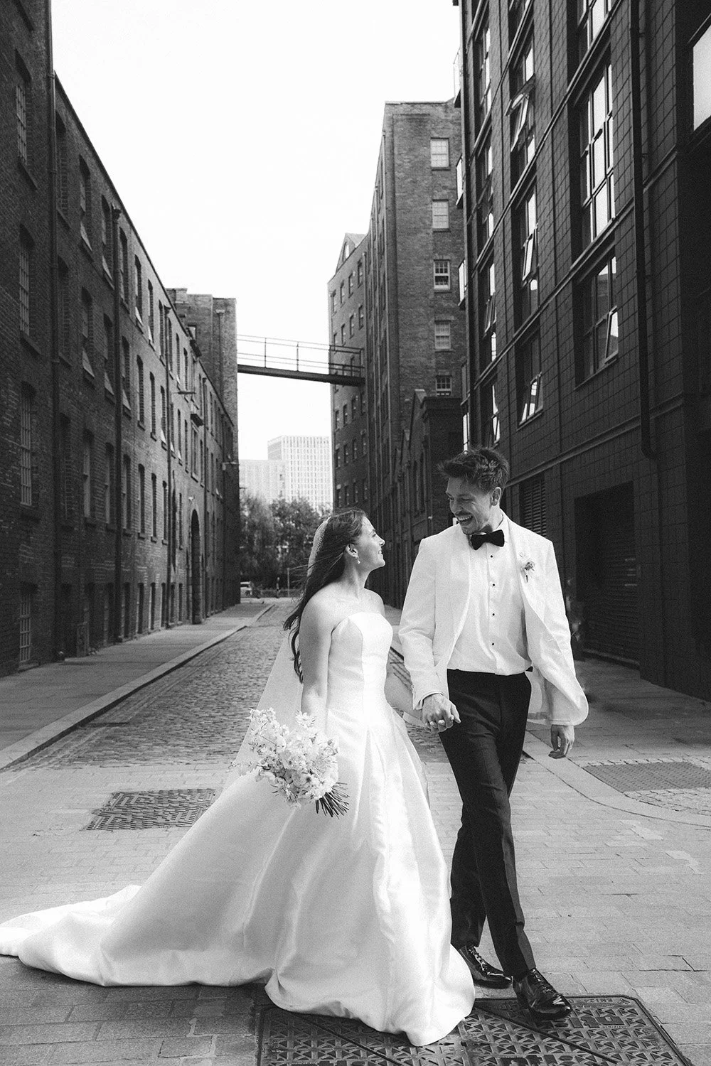 Couple portrait for Hannah & Jake's classic white wedding at Halle St Peter’s, Manchester