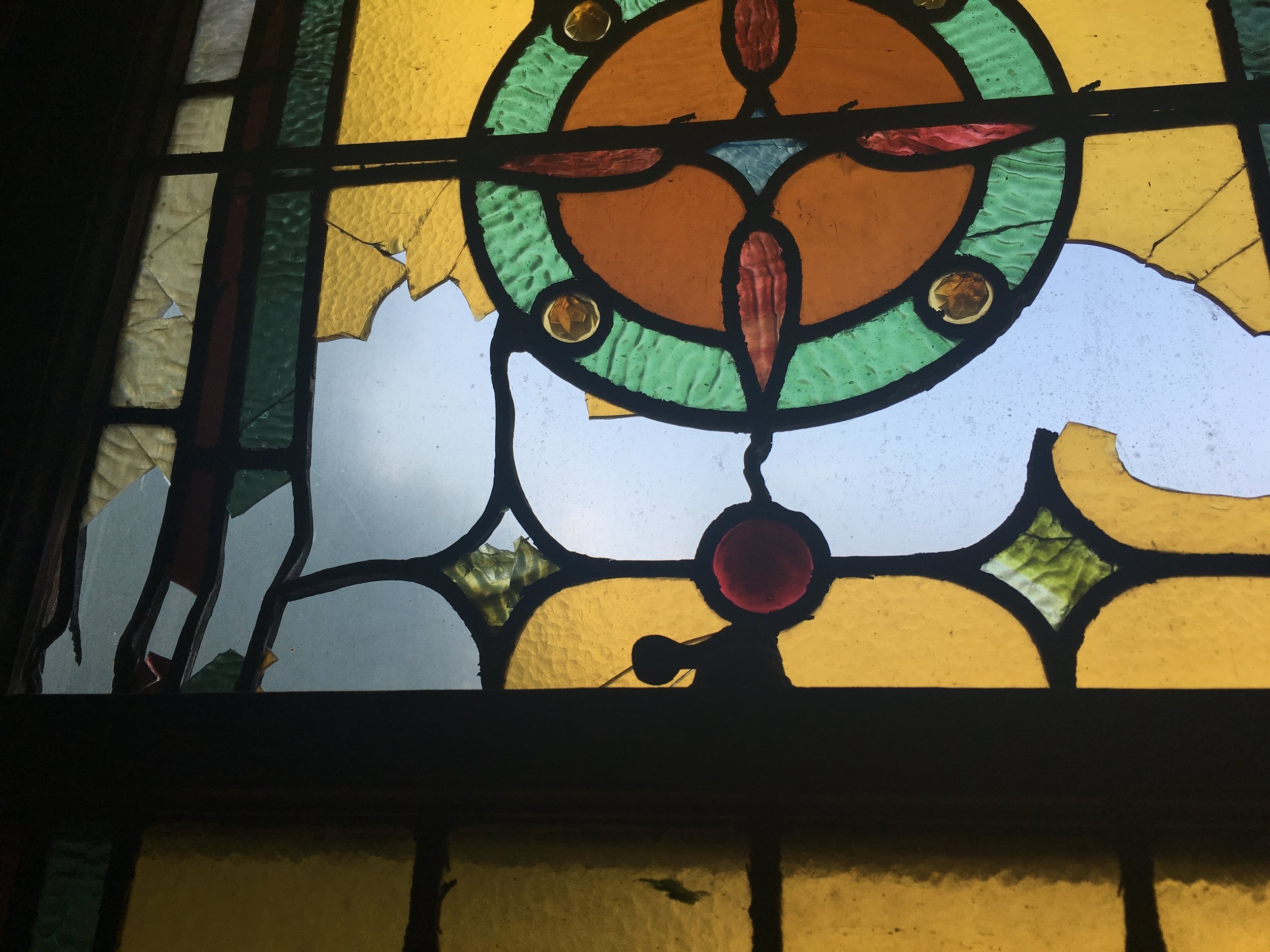  Many of the stained glass windows have been damaged since 1923 from a fire next door. 