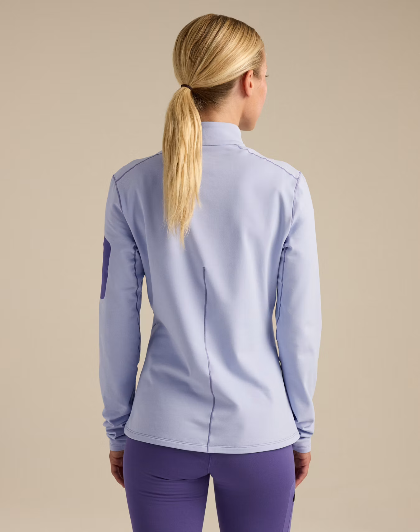 F26-X000010749-Rho-Zip-Neck-Kasumi-Blurple-Women-s-Back-View.png