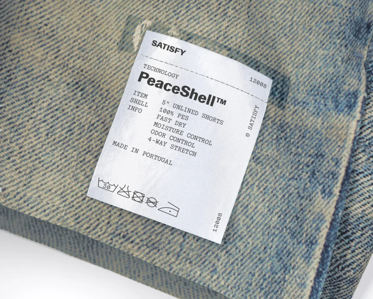 12008-DDE_peaceshell-5-unlined-shorts_digital-denim_label_3b458e43-2c0c-4a48-9a23-f4a4cb5165e3.webp