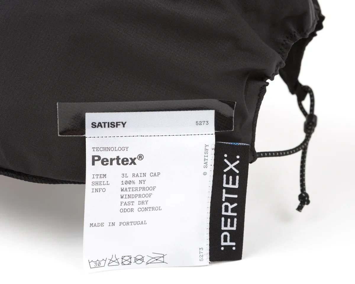 5273-BK_pertex-3l-rain-cap_black_label.webp
