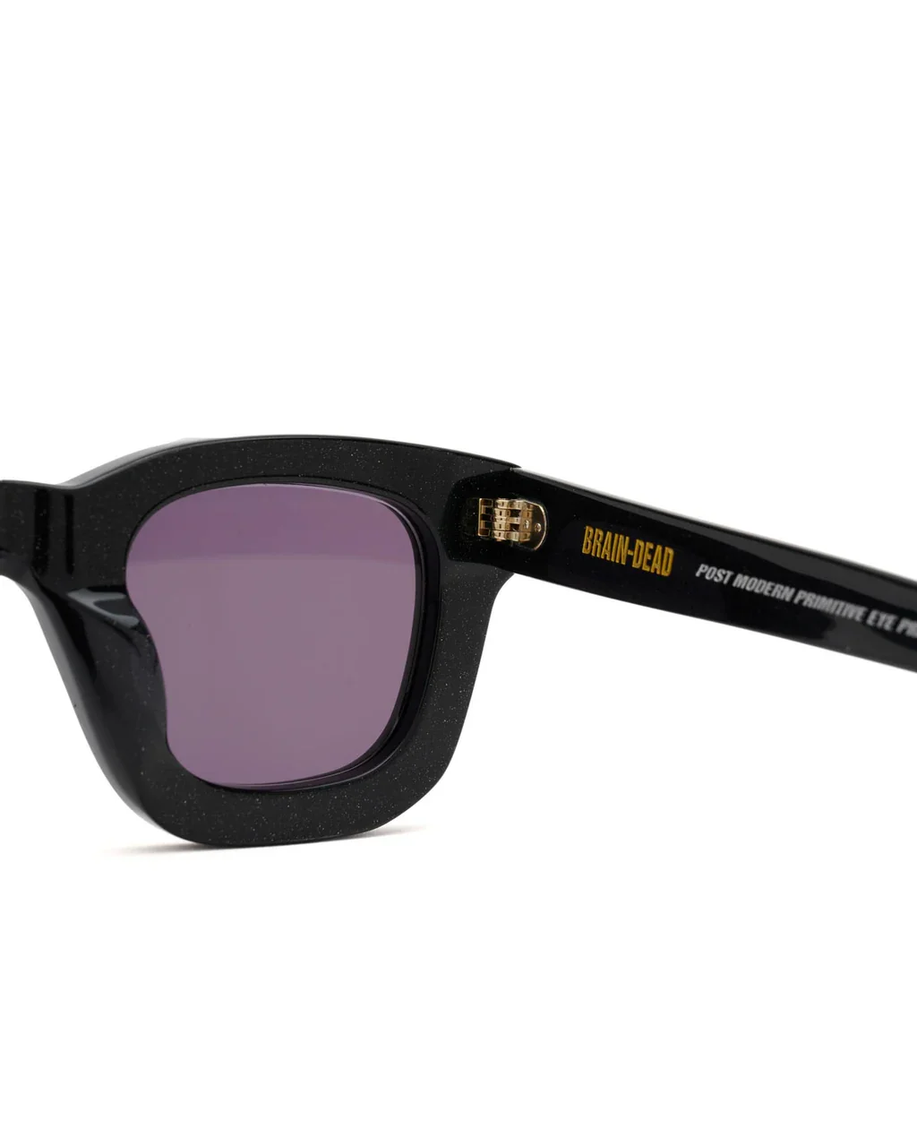 ELIA_POST_MODERN_PRIMITIVE_EYE_PROTECTION_BLACK_SPARKLE_Detail_optimized.webp