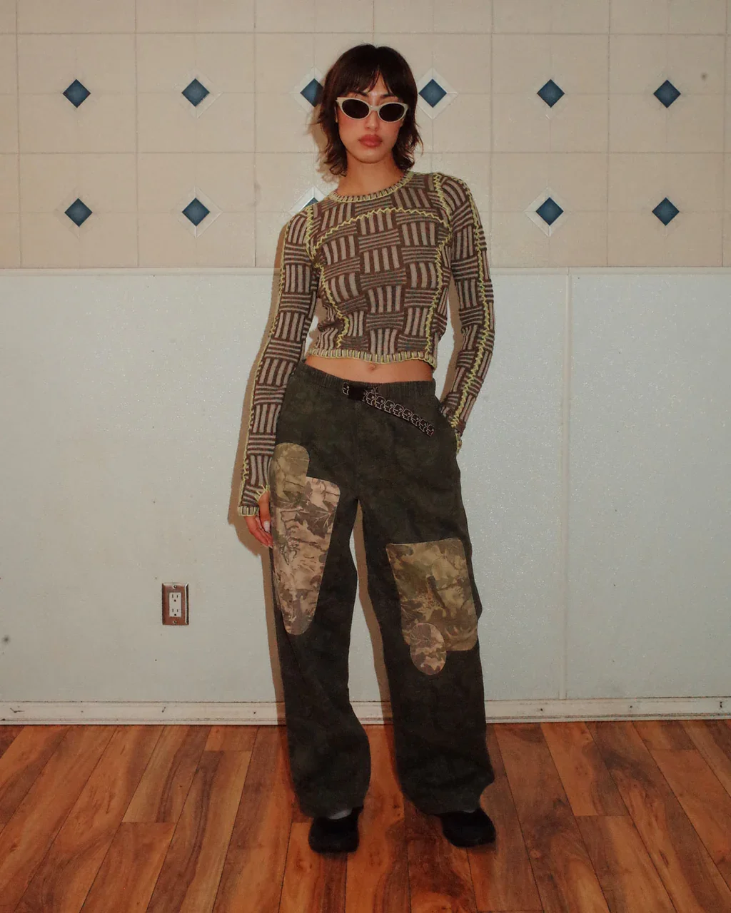 MarielSportKnitLongSleeve-Grey_PatchworkClimberPant-LeafCamo_01-optimized.webp