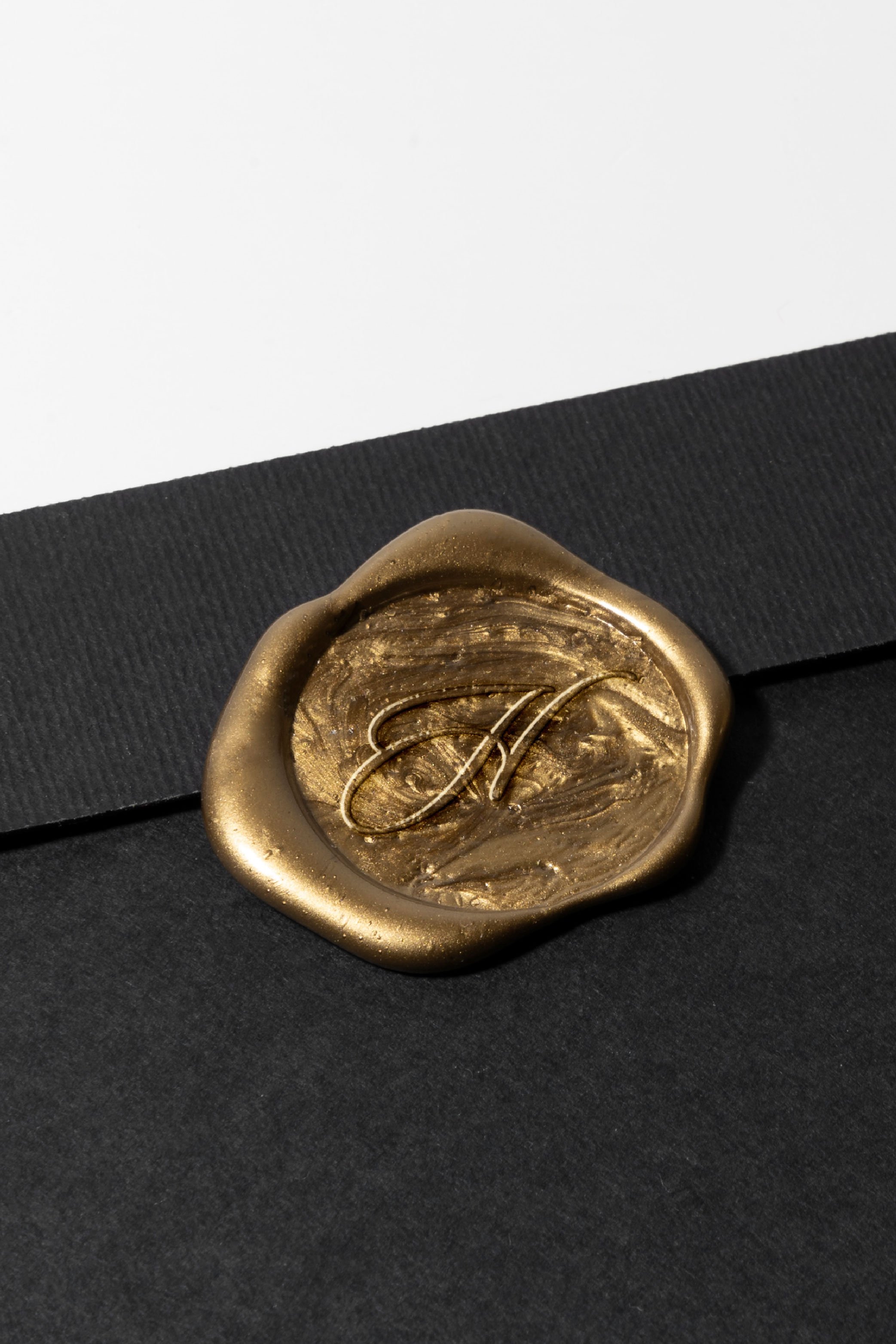  Wax seal with the emblem for Hearthside Event Center pressed into the wax. #montanagraphicdesigner #customlogos #logoandbranddesign #brandingservices #smallbusinessresources #hearthsideeventcenter 