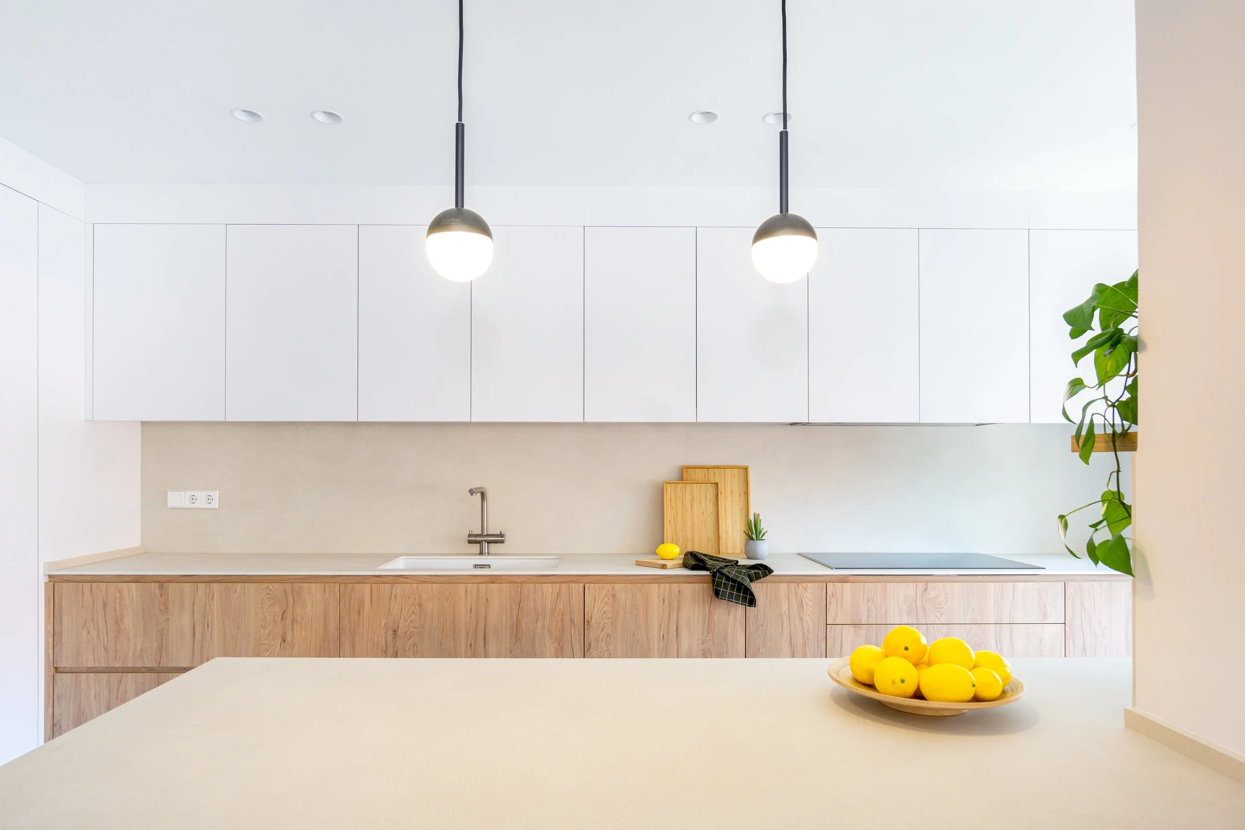 SantQuirze_ReformaIntegral_CocinaMadera_Encimera_Porcelanico.jpg
