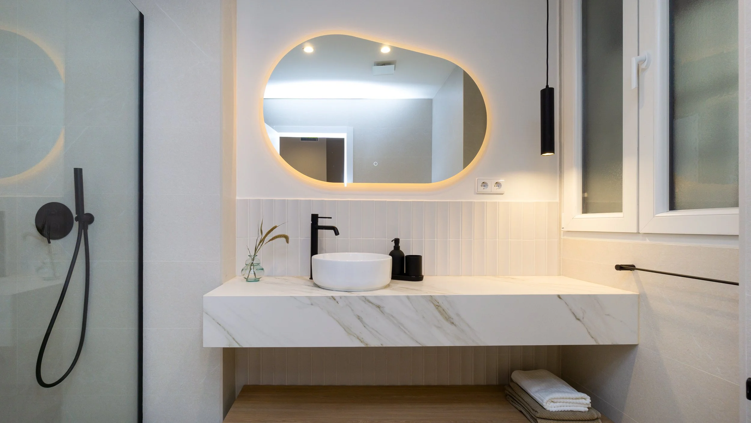 Santa Engracia-Reforma-Integral-Interiorismo-Baño-Encimera-Marmol.jpg