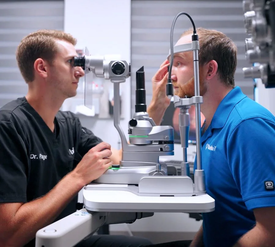 Eye examination between a healthcare professional and a patient at an eye clinic in Redding, CA