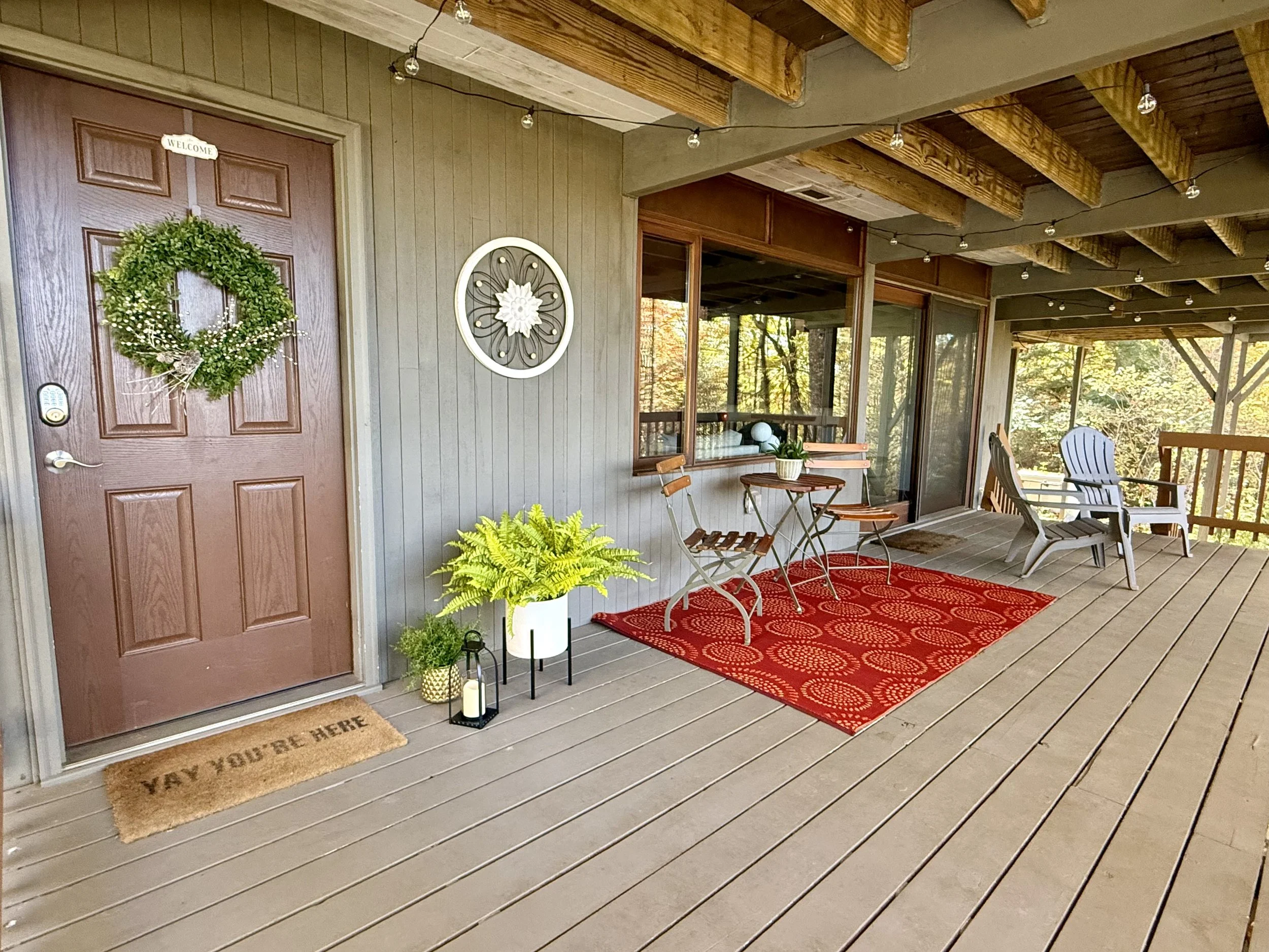 Lower level entrance from deck with seating