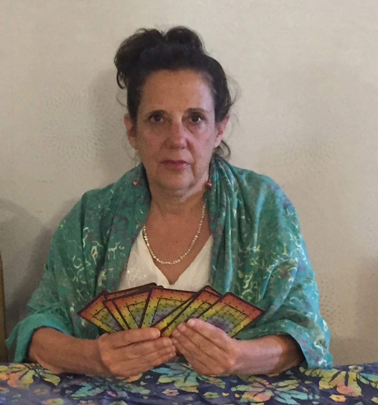 Miriam offering Tarot readings at a Polarity conference.