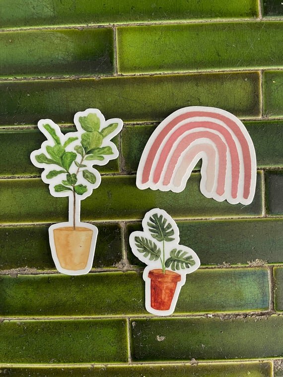 plant and rainbow stickers