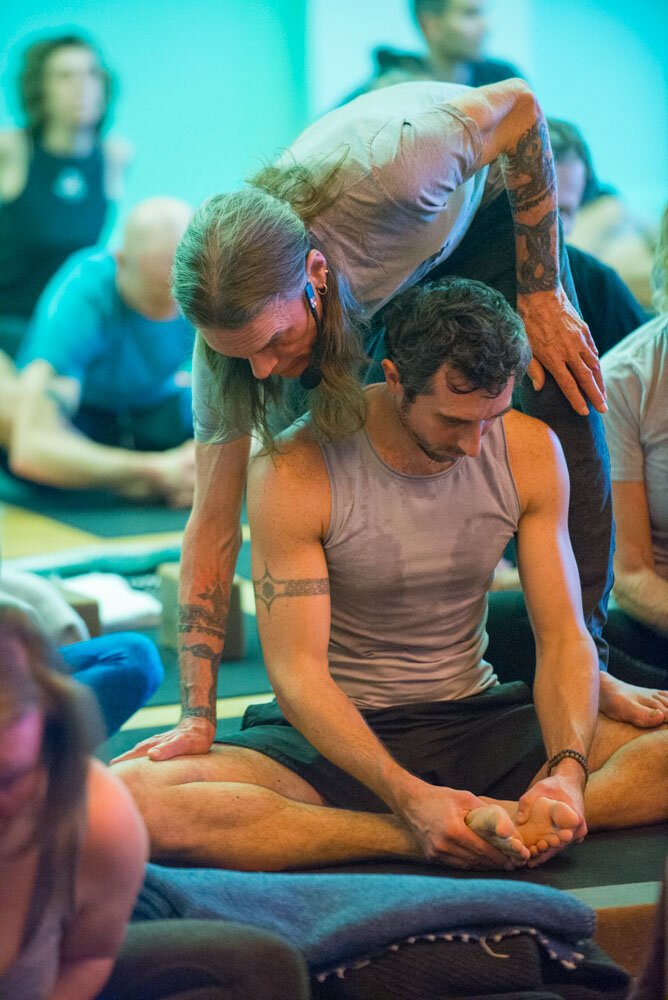 David Life gives padmasana assist