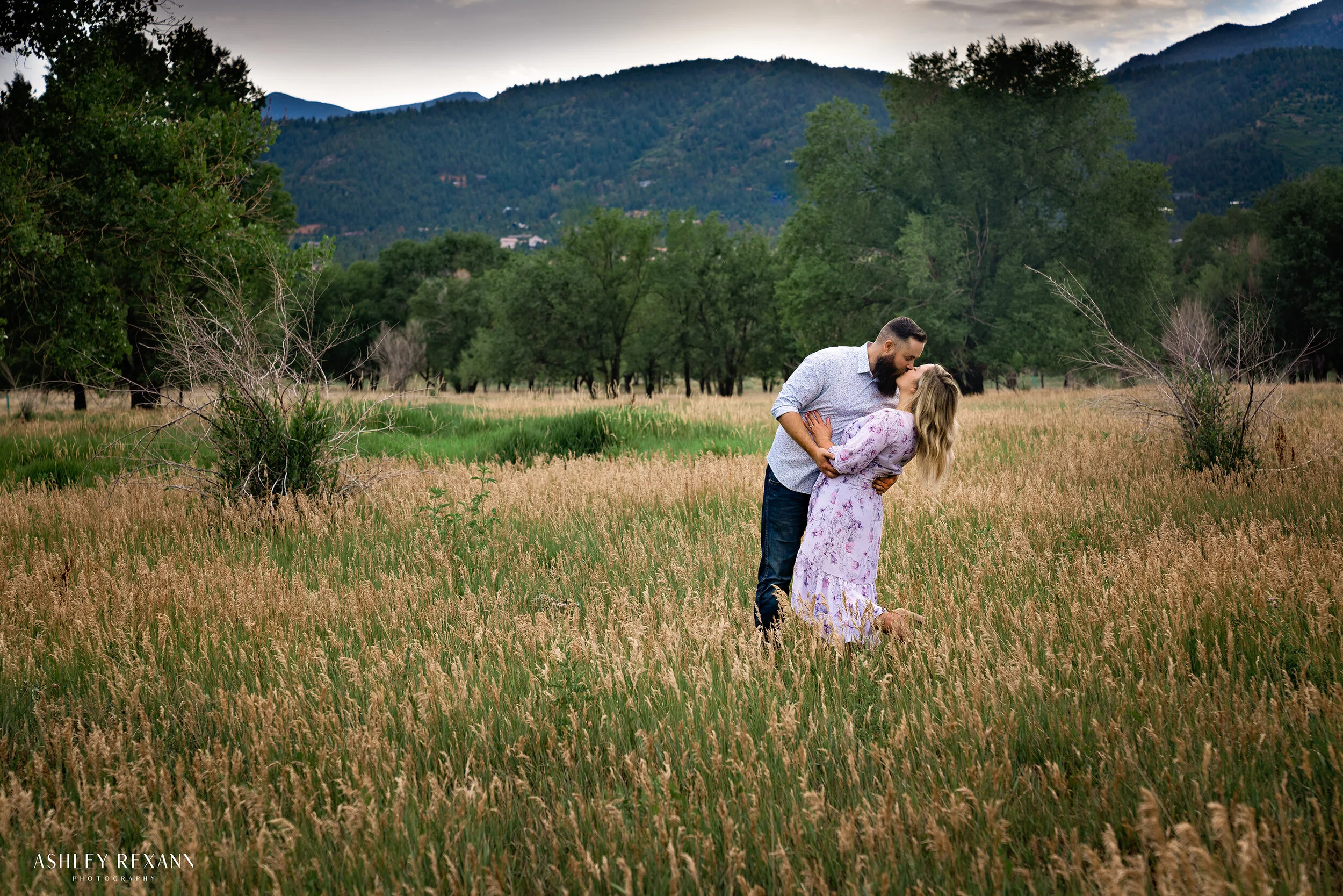 couple dip and kiss with logo.jpg