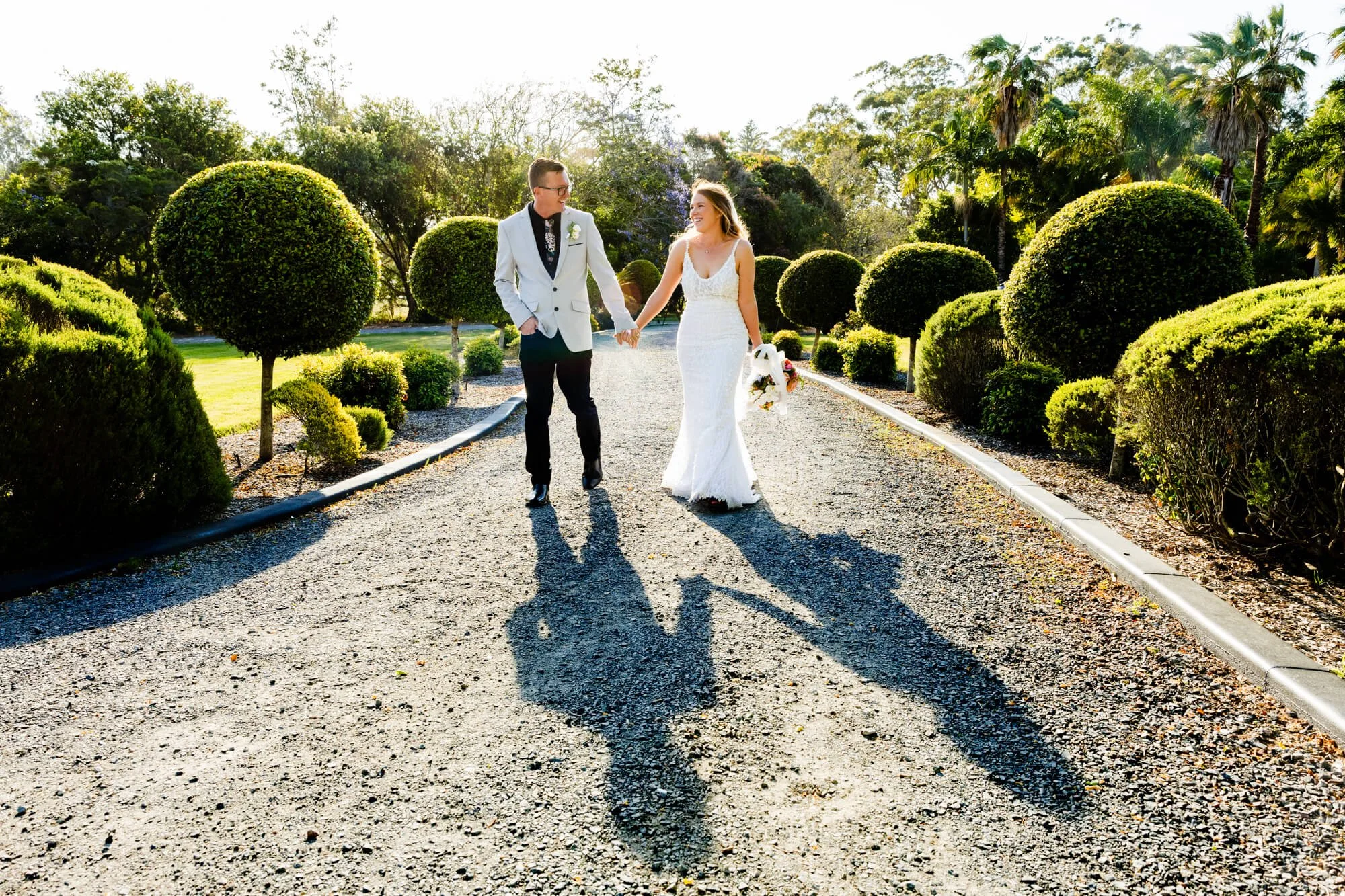 Creative shoot with wedding couple and their shadow
