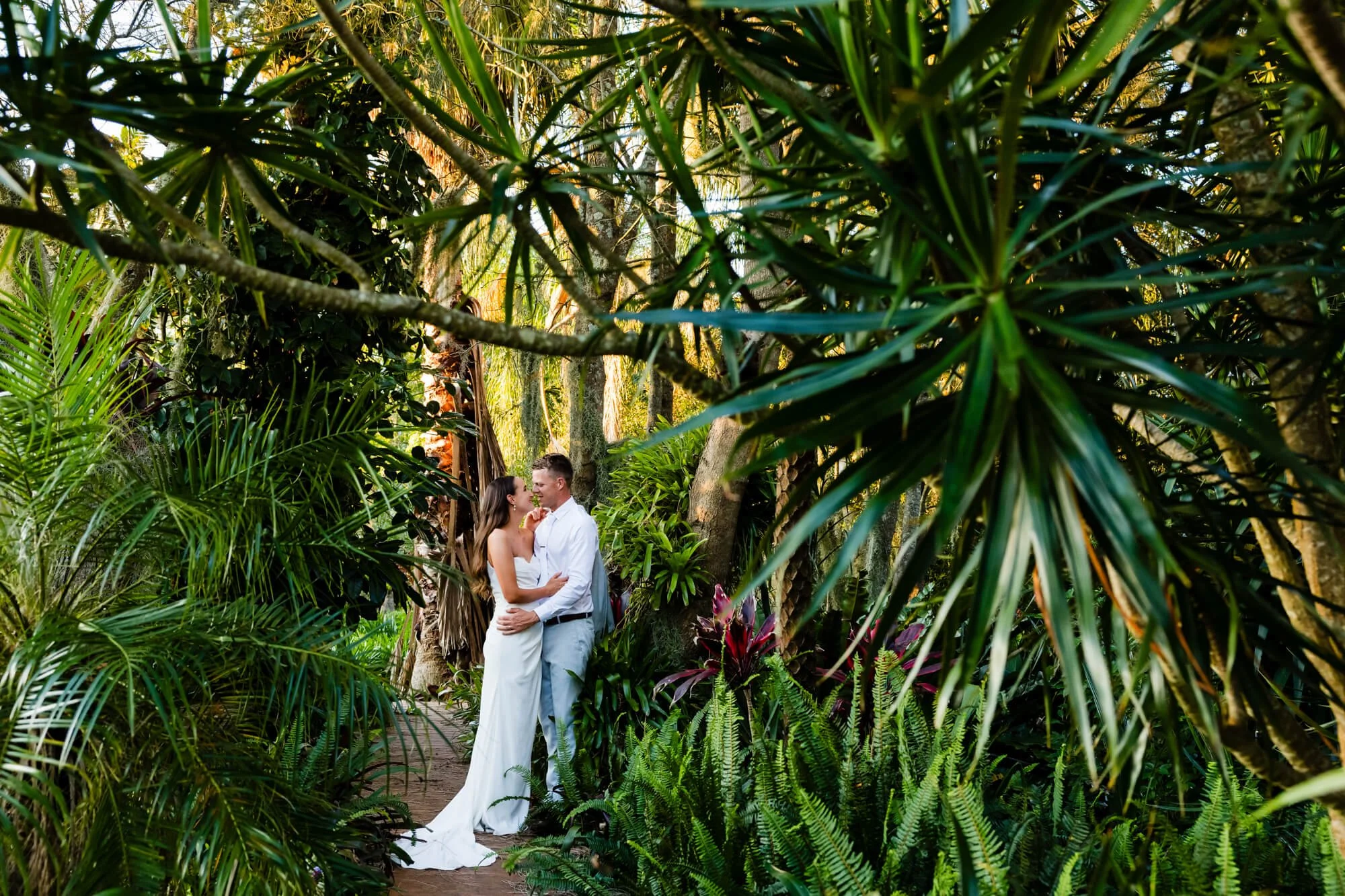 bride and groom in Tropical garden