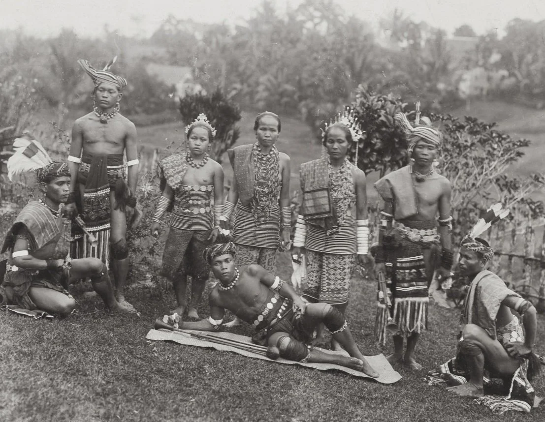 KITLV_-_3605_-_Lambert_%26_Co.%2C_G.R._-_Singapore_-_Dayak_men_and_women_at_Kuching_in_Sarawak%2C_Malaysia%2C_Borneo_-_circa_1900.jpg