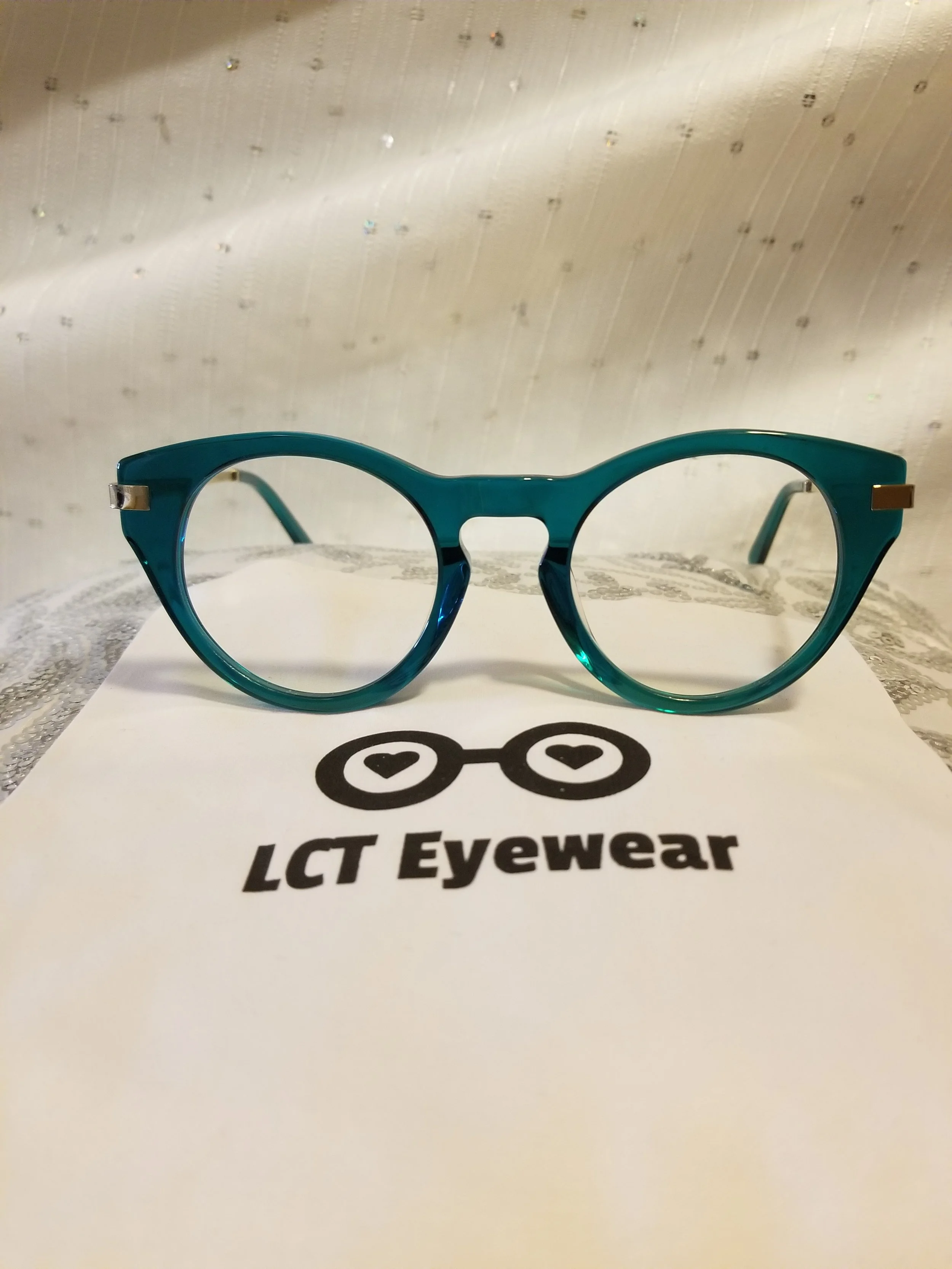 https://www.lcteyewear.com/eyeglass-frames/p/lct-crystal-green-frame