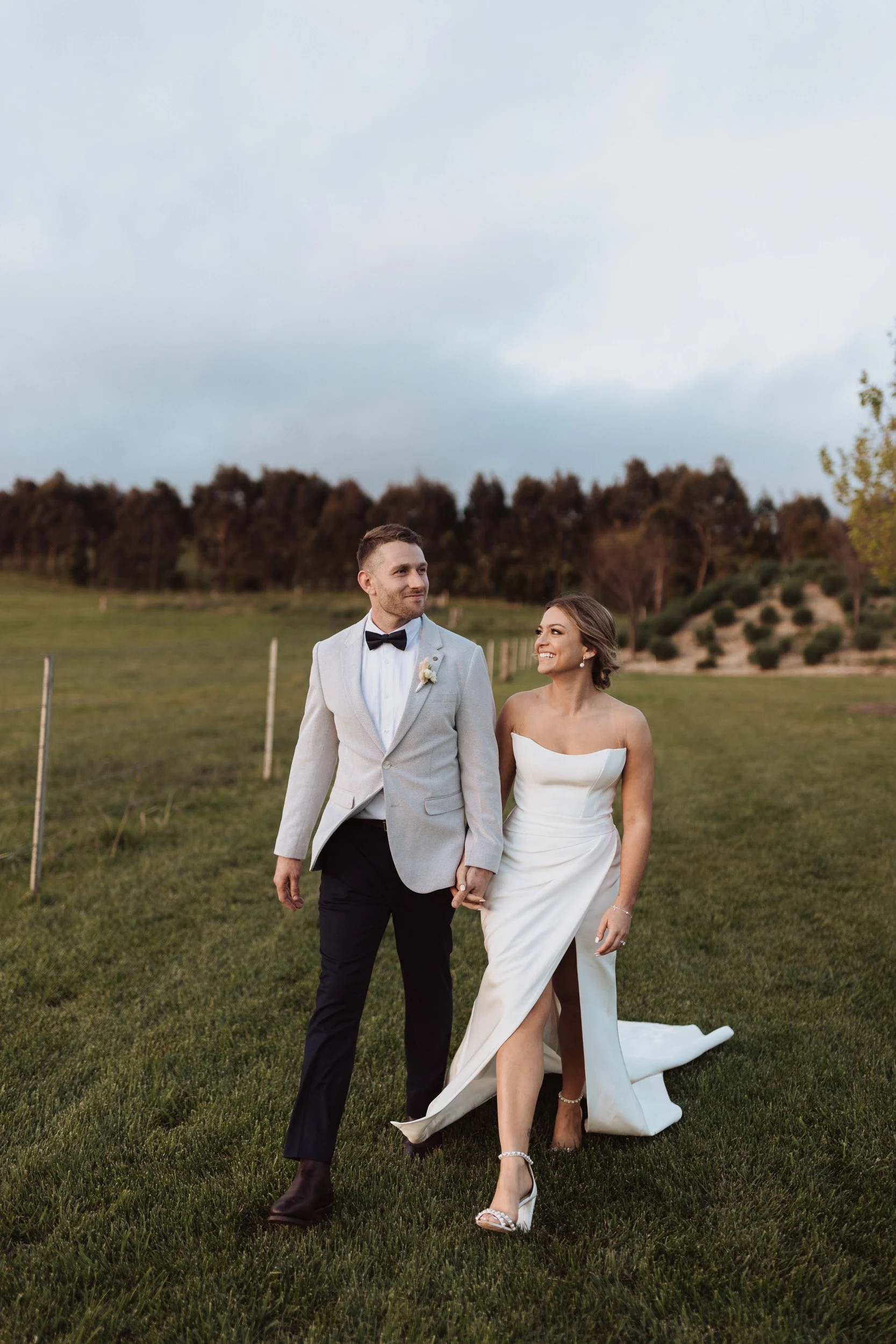 Bride and Groom walking in Bendooley Estate