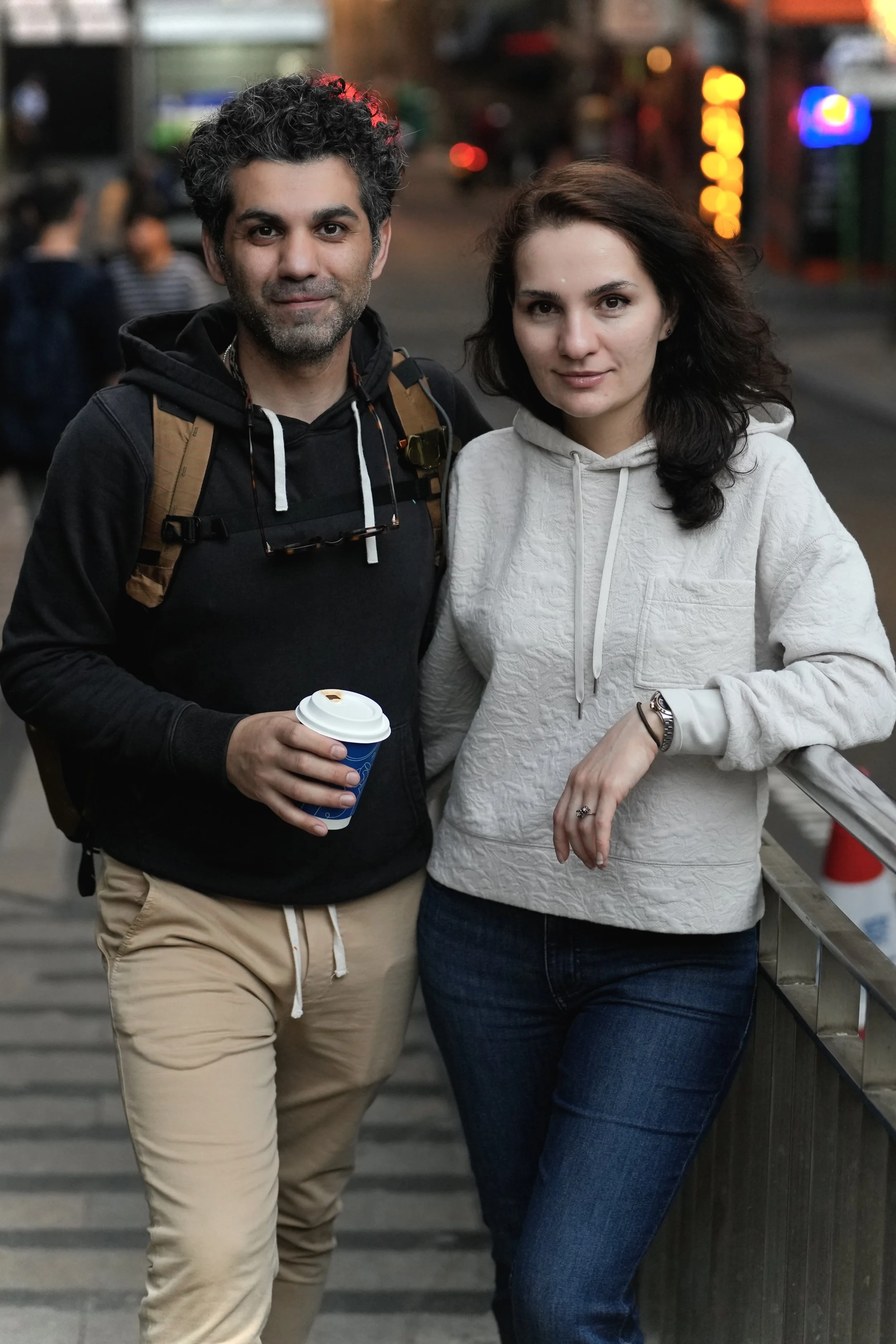Happy husband and wife standing together