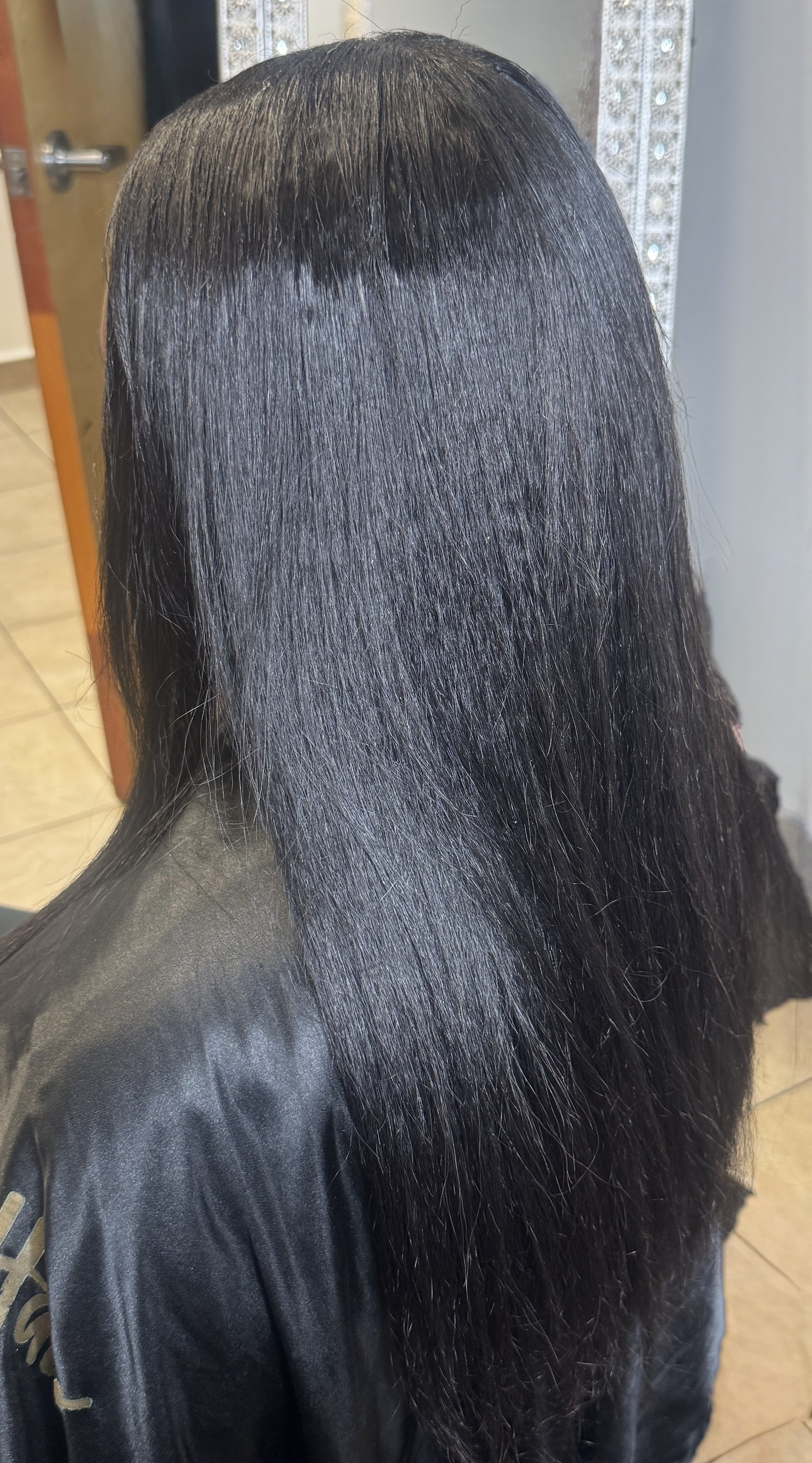 Sew in with minimal leave out with 2 kinky straight bundles