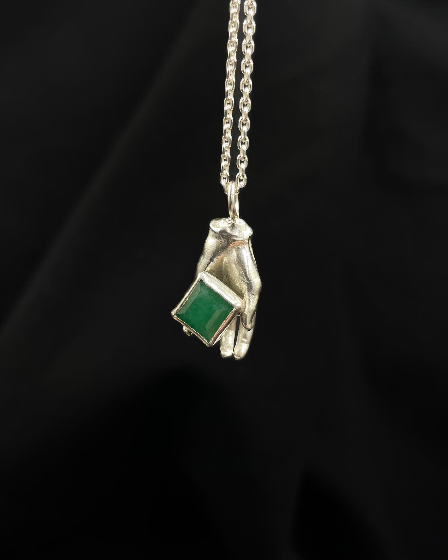 Swipe-&gt; Silver Hands Emerald Necklace. Please tap the image to view the product tags, and tap a product tag to checkout on my website. 

This necklace features an emerald set in fine silver, soldered to a casted silver hand.
