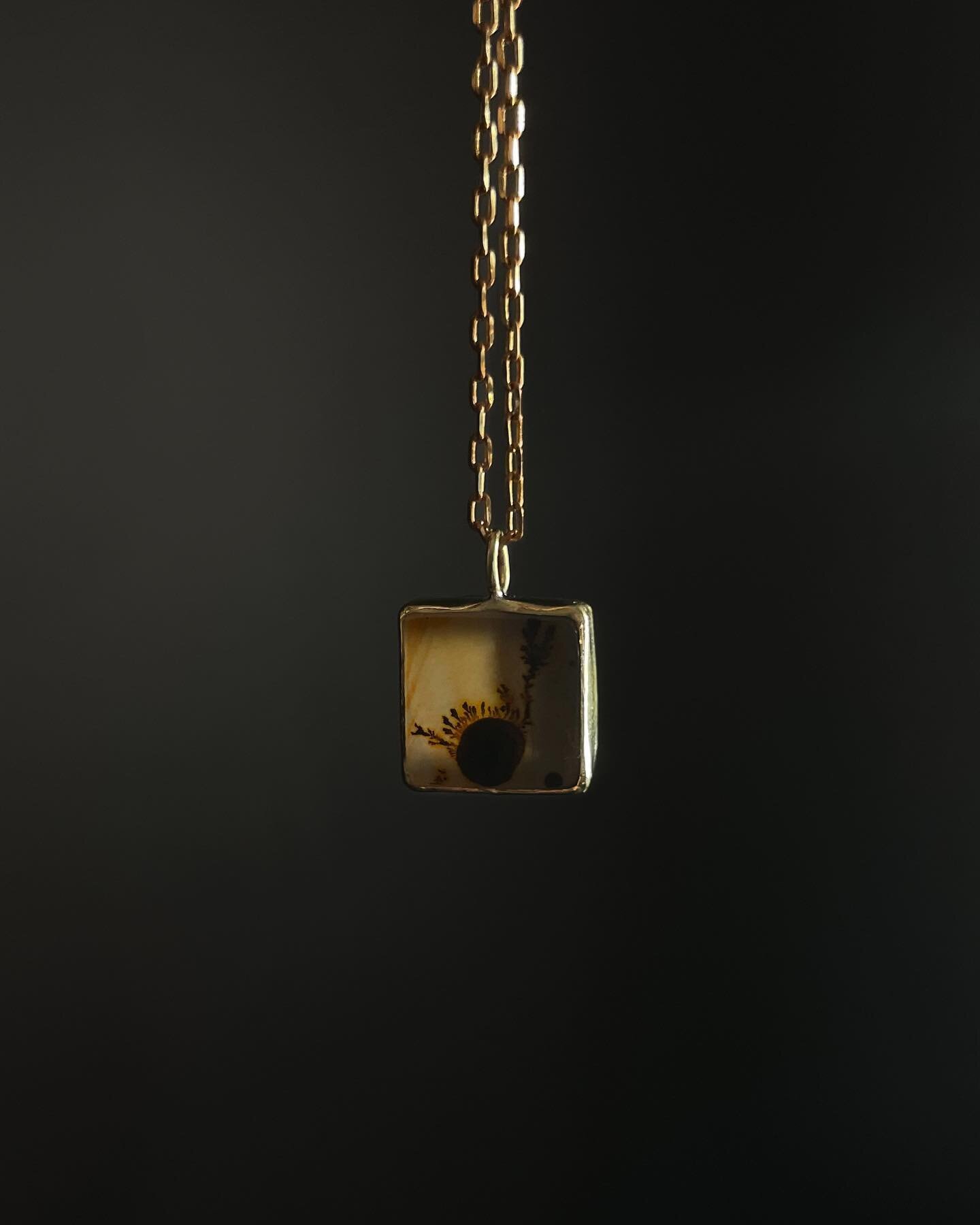Swipe-&gt; &ldquo;Blotch Square Ink&rdquo; Brass Necklace. Please tap the image to view the product tags, and tap a product tag to checkout on my website. 

This brass square necklace holds a blotchy dendritic agate and a brass 18&rdquo; chain.