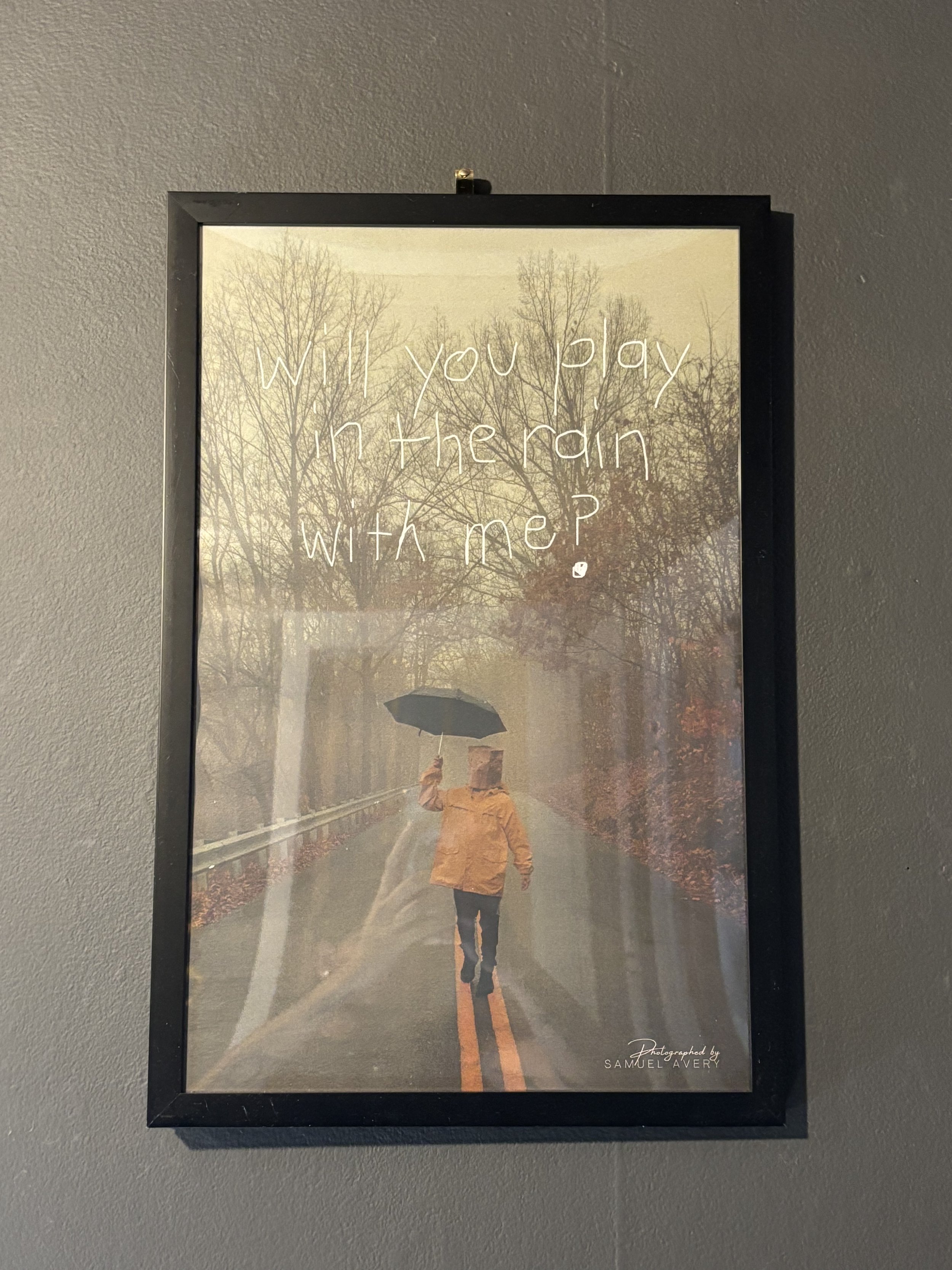 "Paper Bag Boy" Rain Framed Print