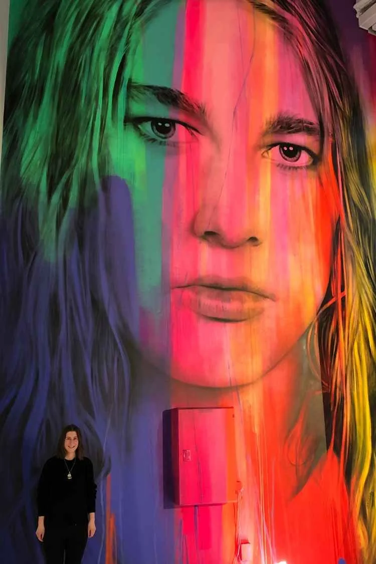 multi-coloured large painting of Daniel Johns from Silverchair displayed at his exhibition in Melbourne