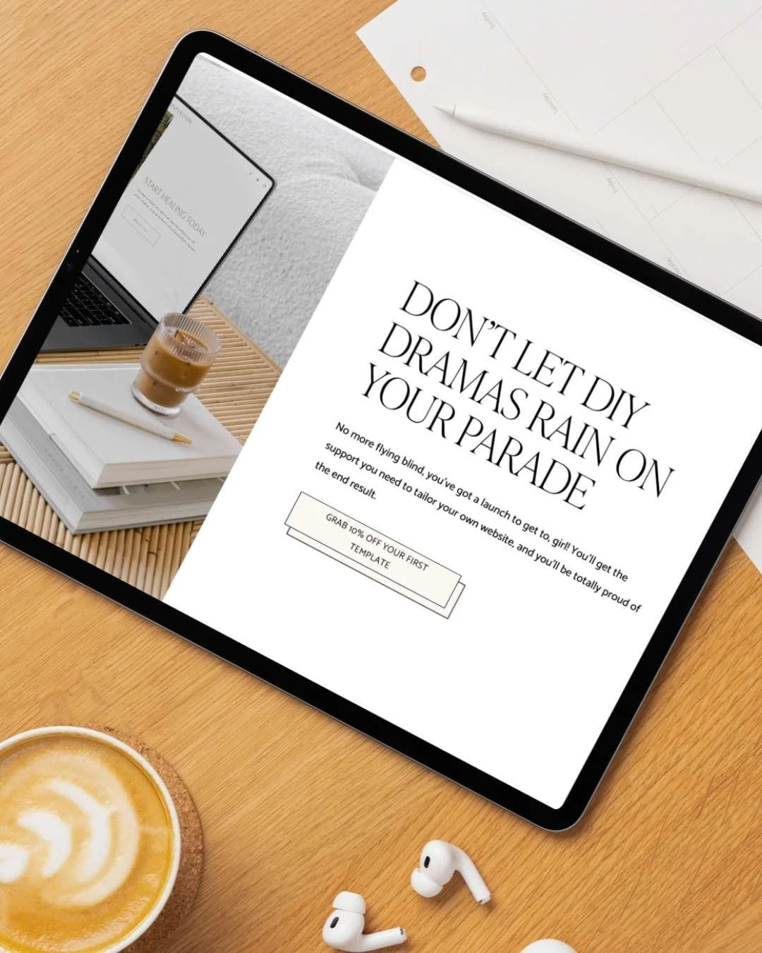 Website copy example on a digital tablet that Sarah Marriott wrote for Elisabeth Barnes. The desk it is resting on is wooden, with a coffee cup, calendar and earbuds