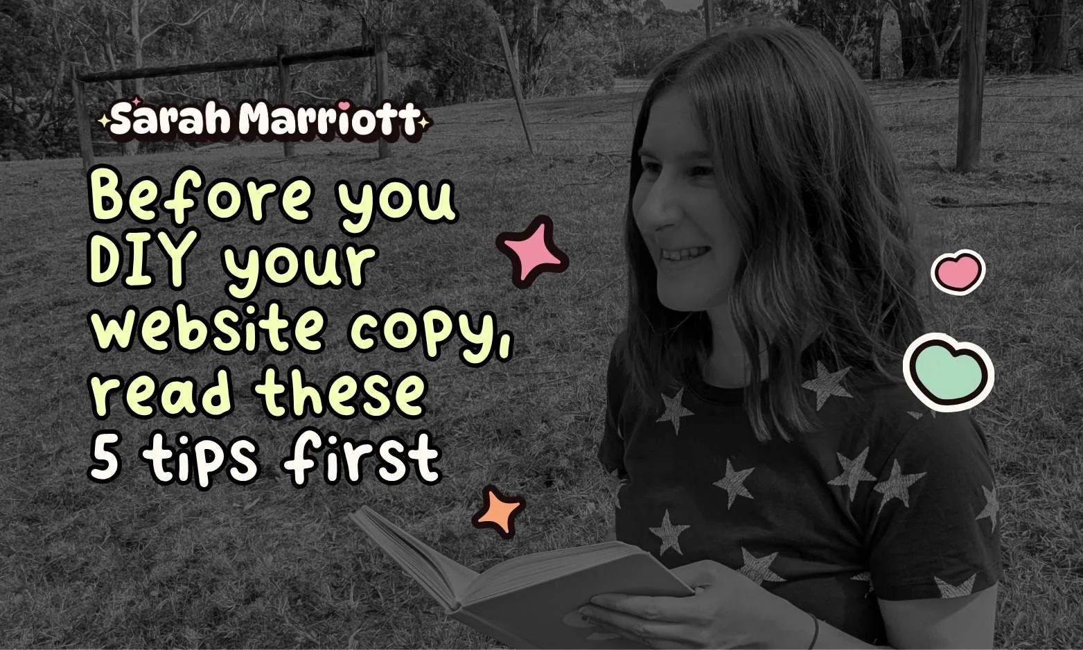 Sarah holding a notebook looking cheerful in a relaxed country environment