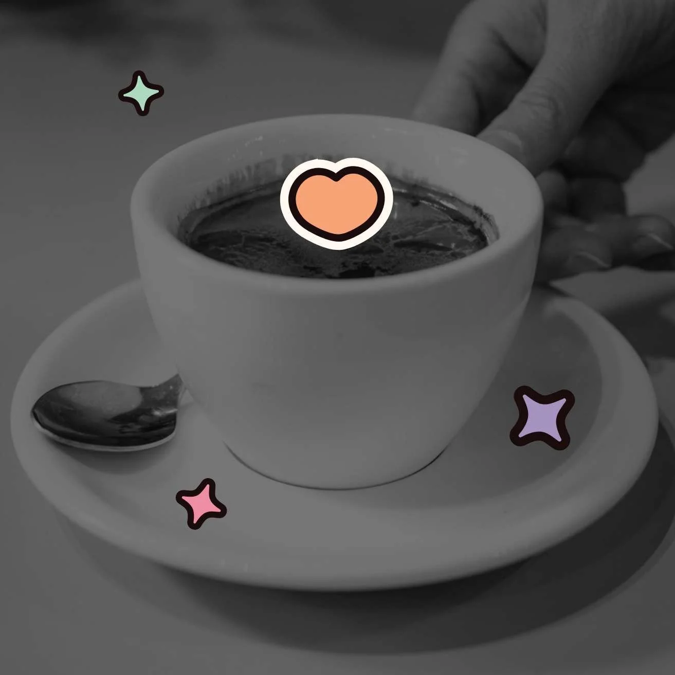 greyscale-style coffee cup, spoon and sourcer with colourful heart and star graphics