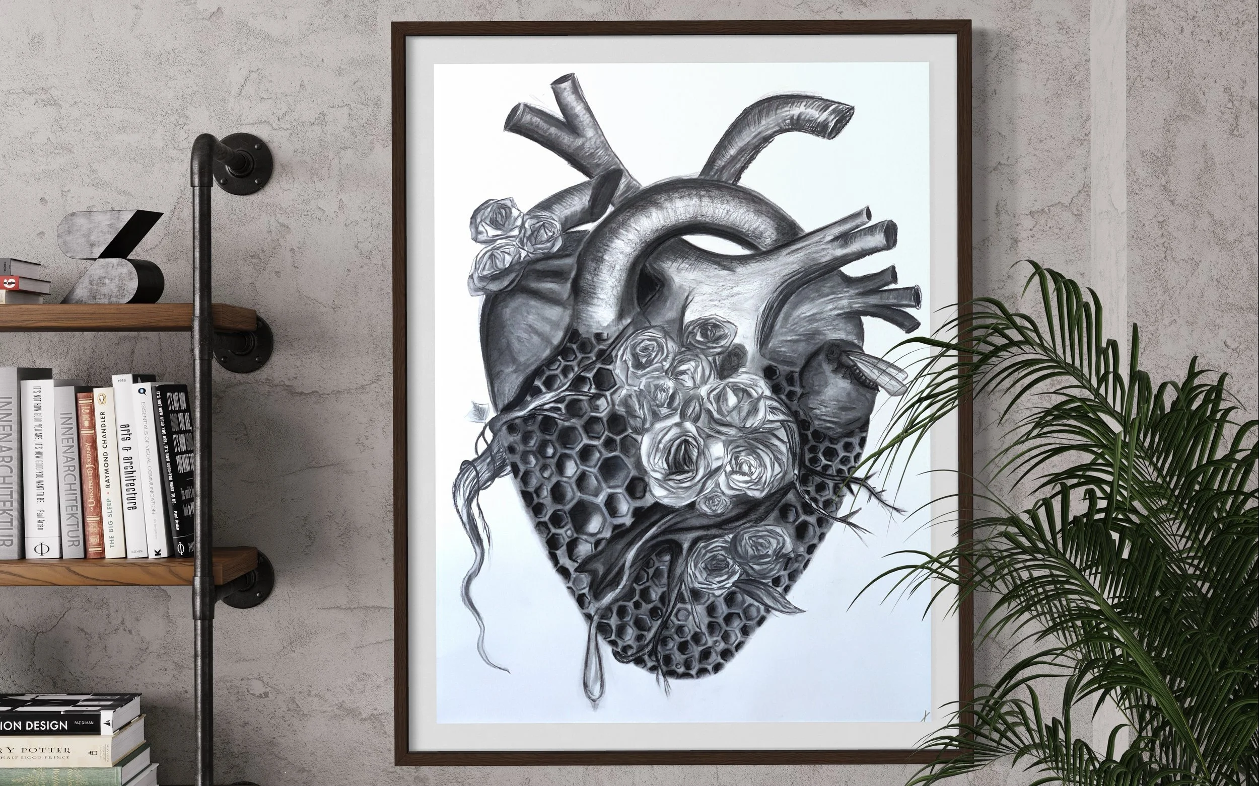 Black and white drawing of a human heart intertwined with roses, honeycomb pattern, and branches framed in a brown wooden frame, in a modern room.