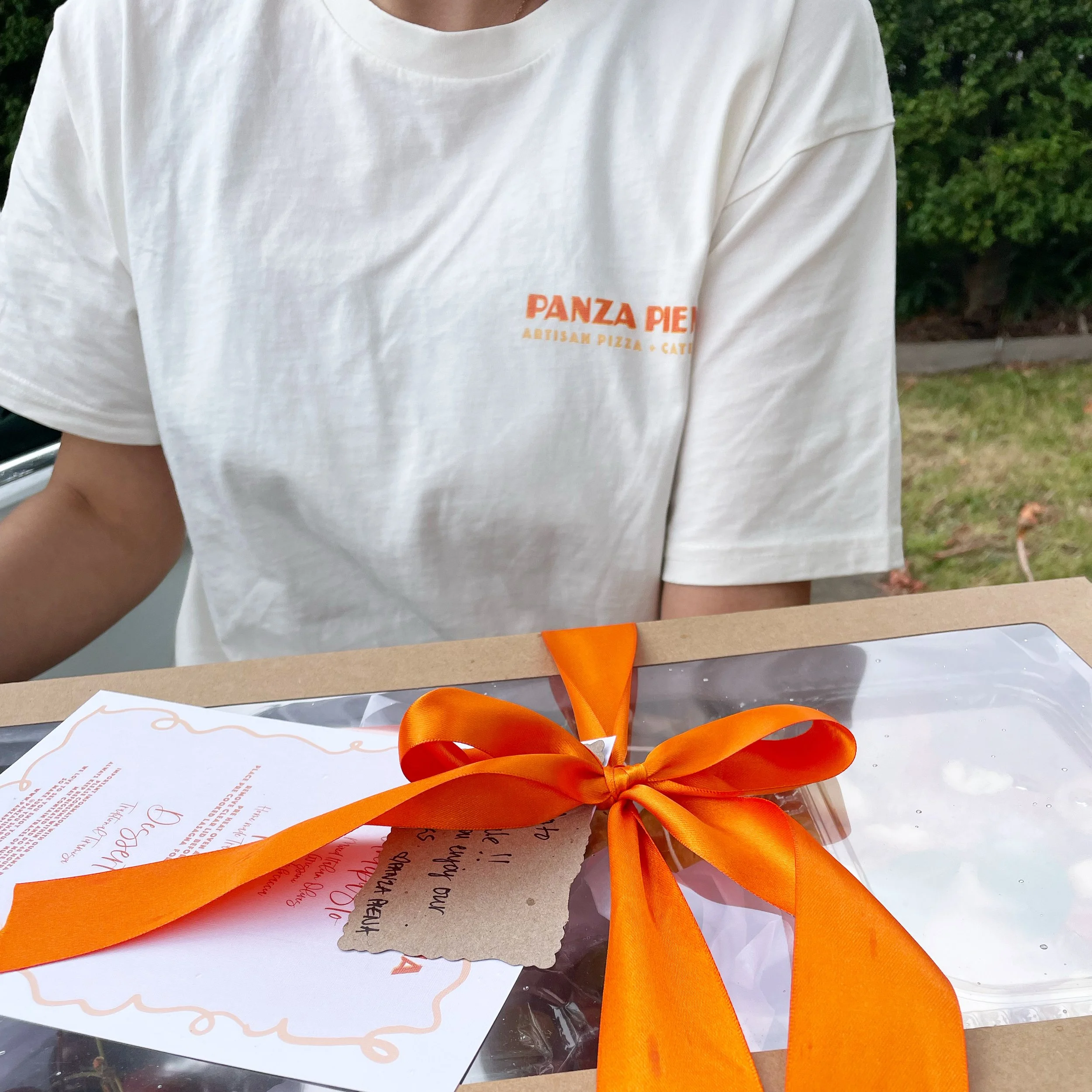 A person holding Panza Piena packs