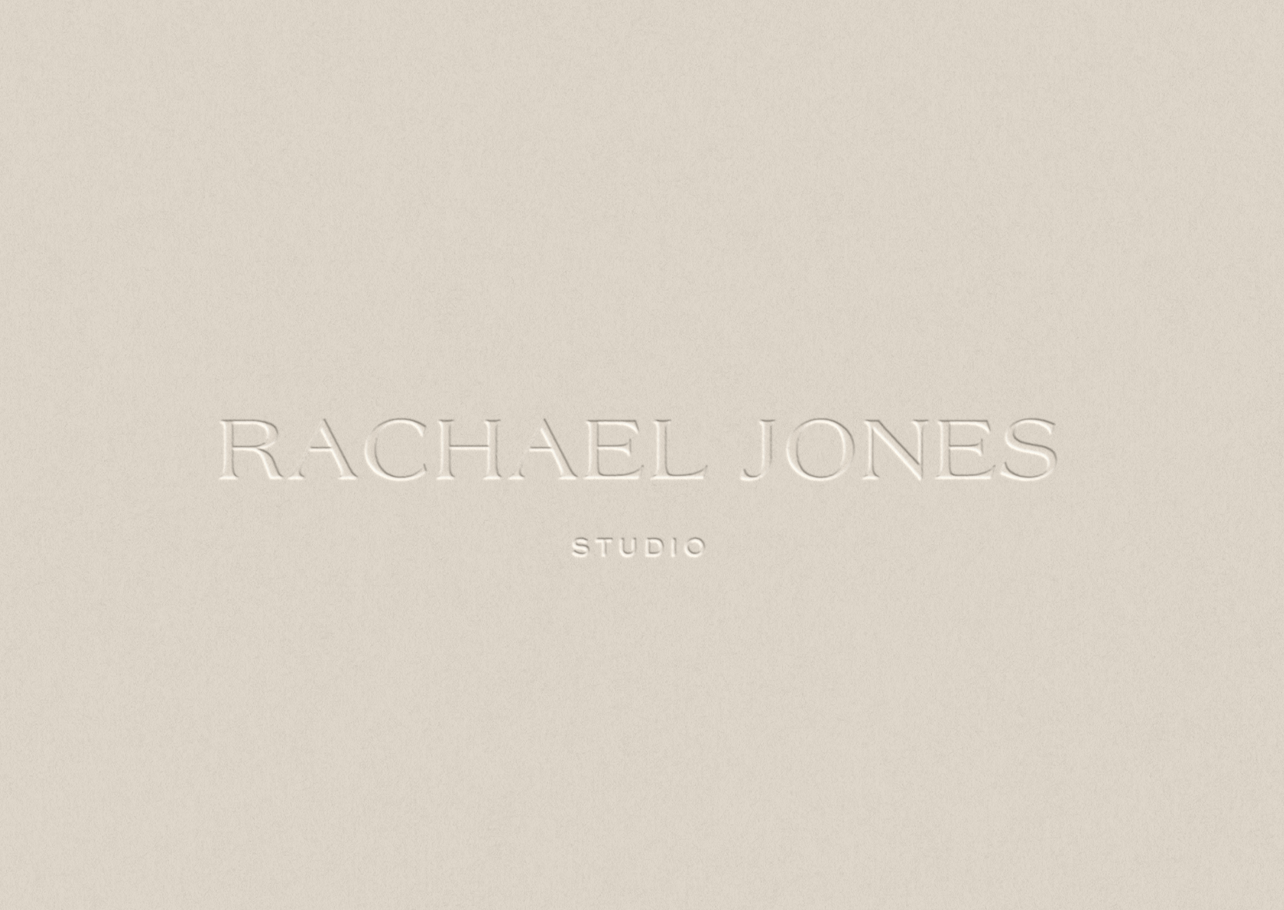 Neutral logo debossed wordmark for Rachael Jones Studio