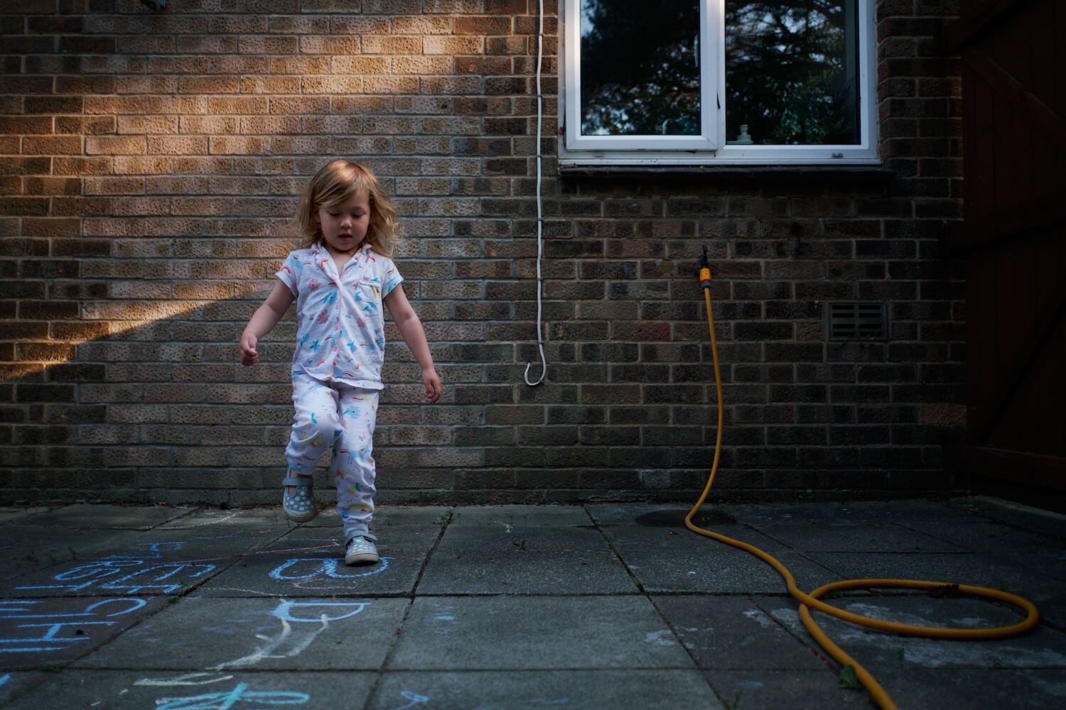 Documentary Family Photography in Dorset - Daisy playing hopscotch again