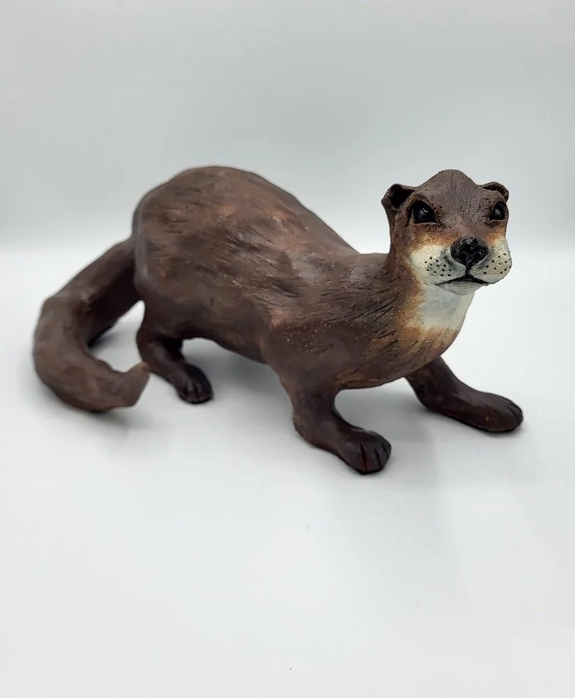 Crawling otter 33 x 17 x 20 £195.jpg