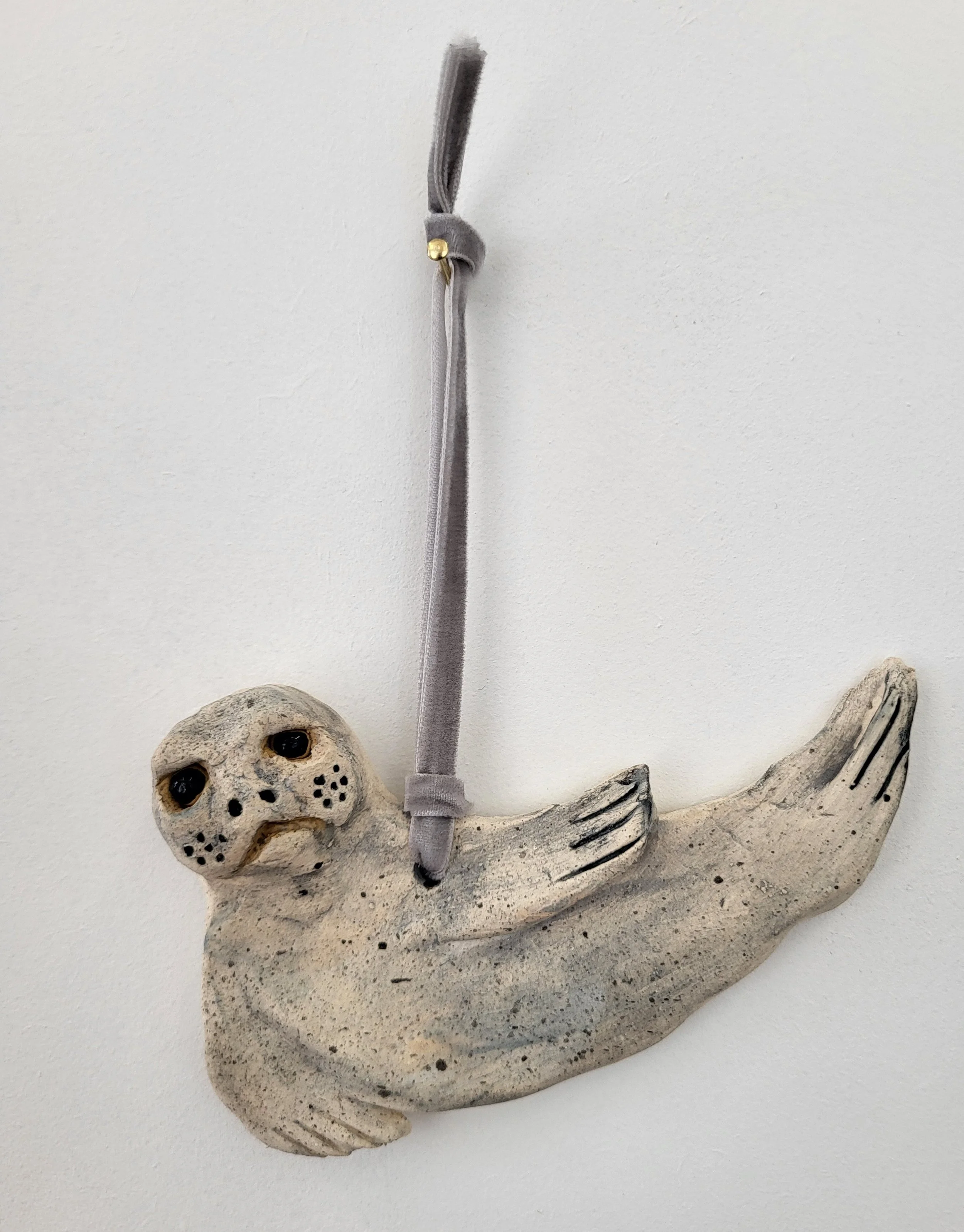 Resting seal hanging charm