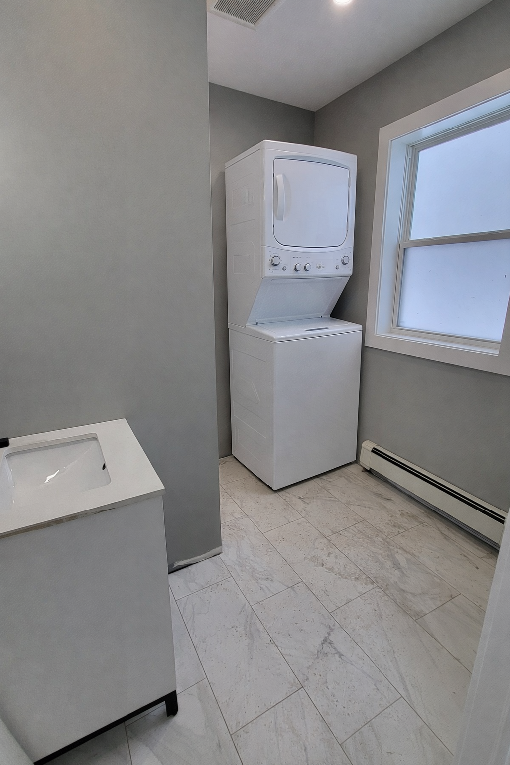 Groundlevel washroom with laundry.png