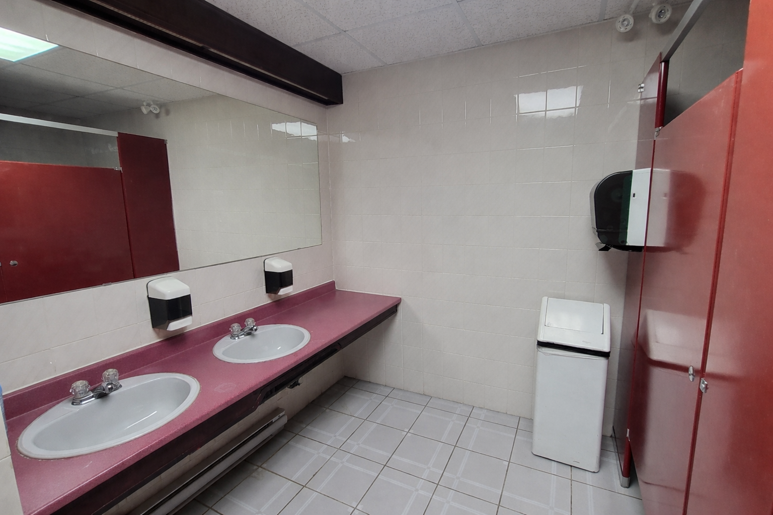 Pristine public restroom interior.png