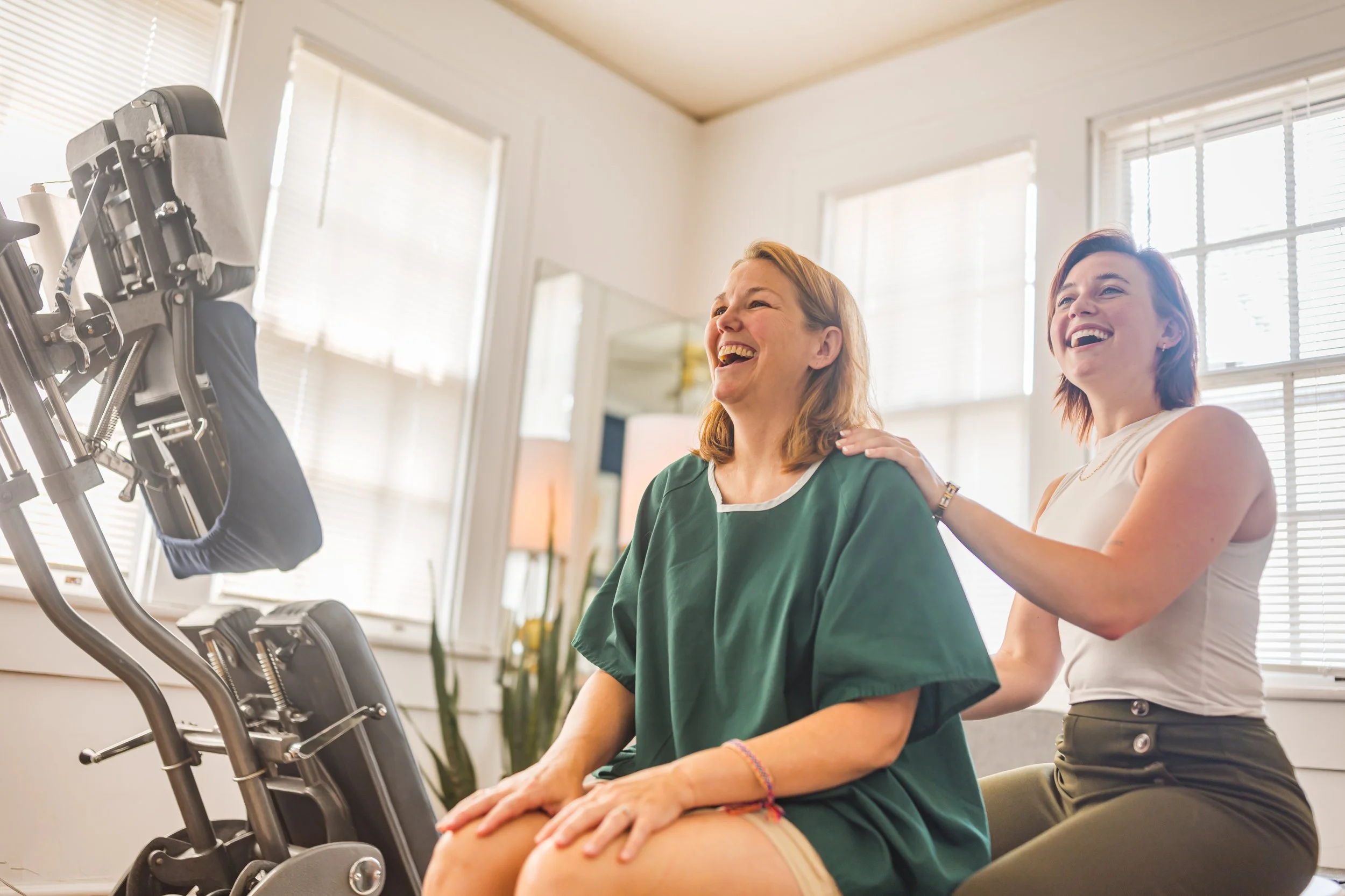 A patient receiving a Gonstead chiropractic exam by Dr. Victoria.